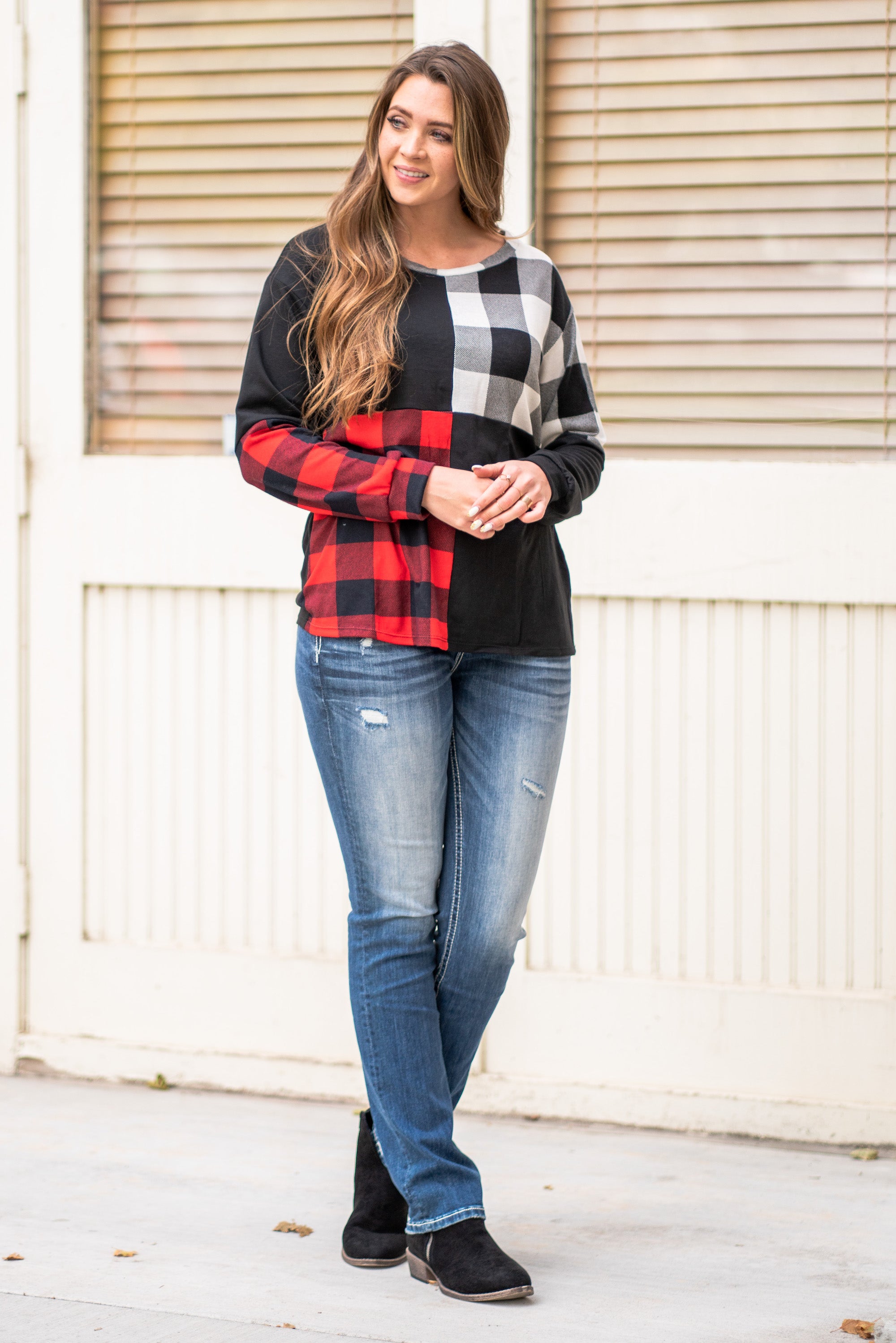 BiBi Throw on for an easy casual look with your favorite jeans this fall. Color: Black Neckline: V Neck Sleeve: Long Style #: BT2116 Contact us for any additional measurements or sizing.