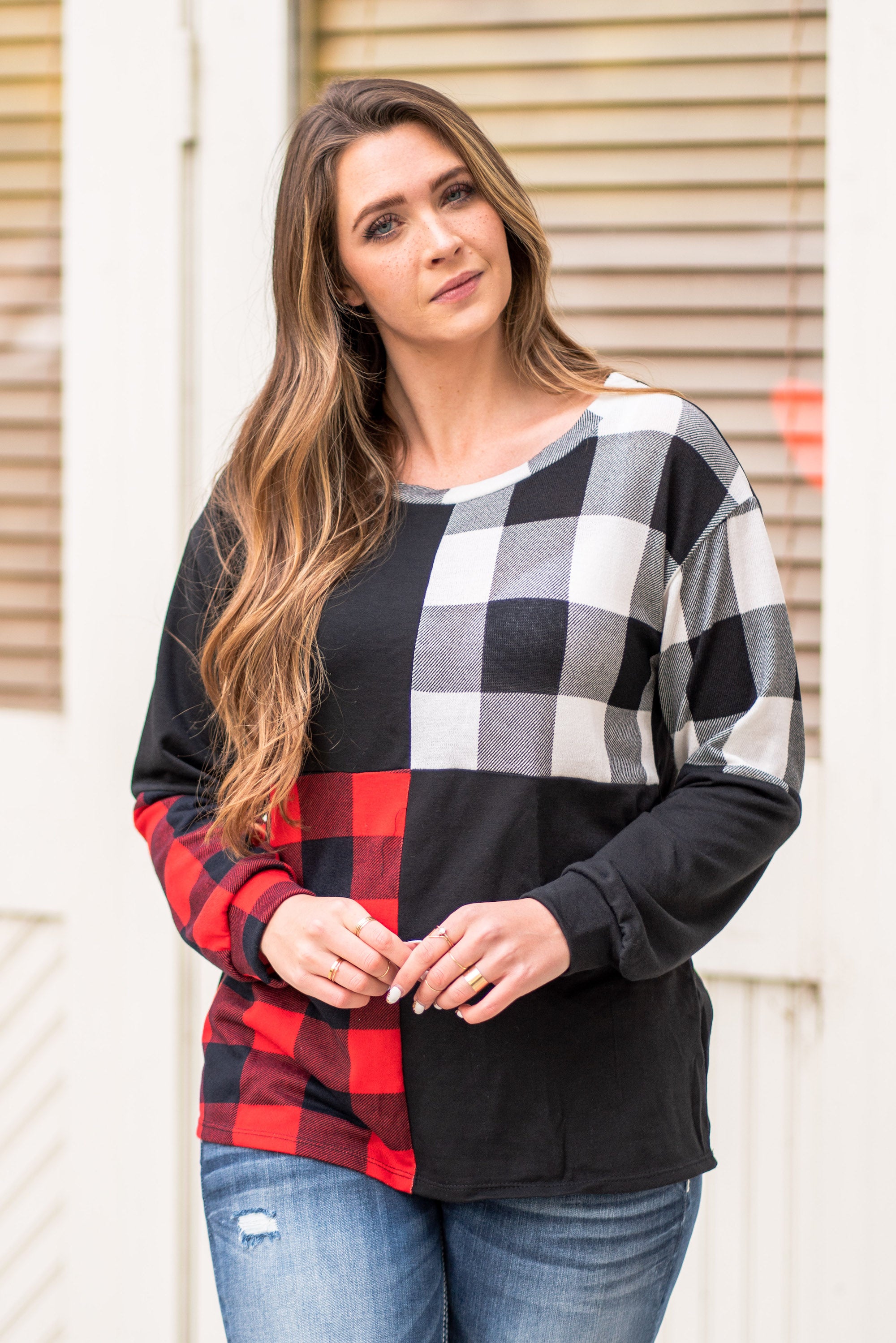 BiBi Throw on for an easy casual look with your favorite jeans this fall. Color: Black Neckline: V Neck Sleeve: Long Style #: BT2116 Contact us for any additional measurements or sizing.