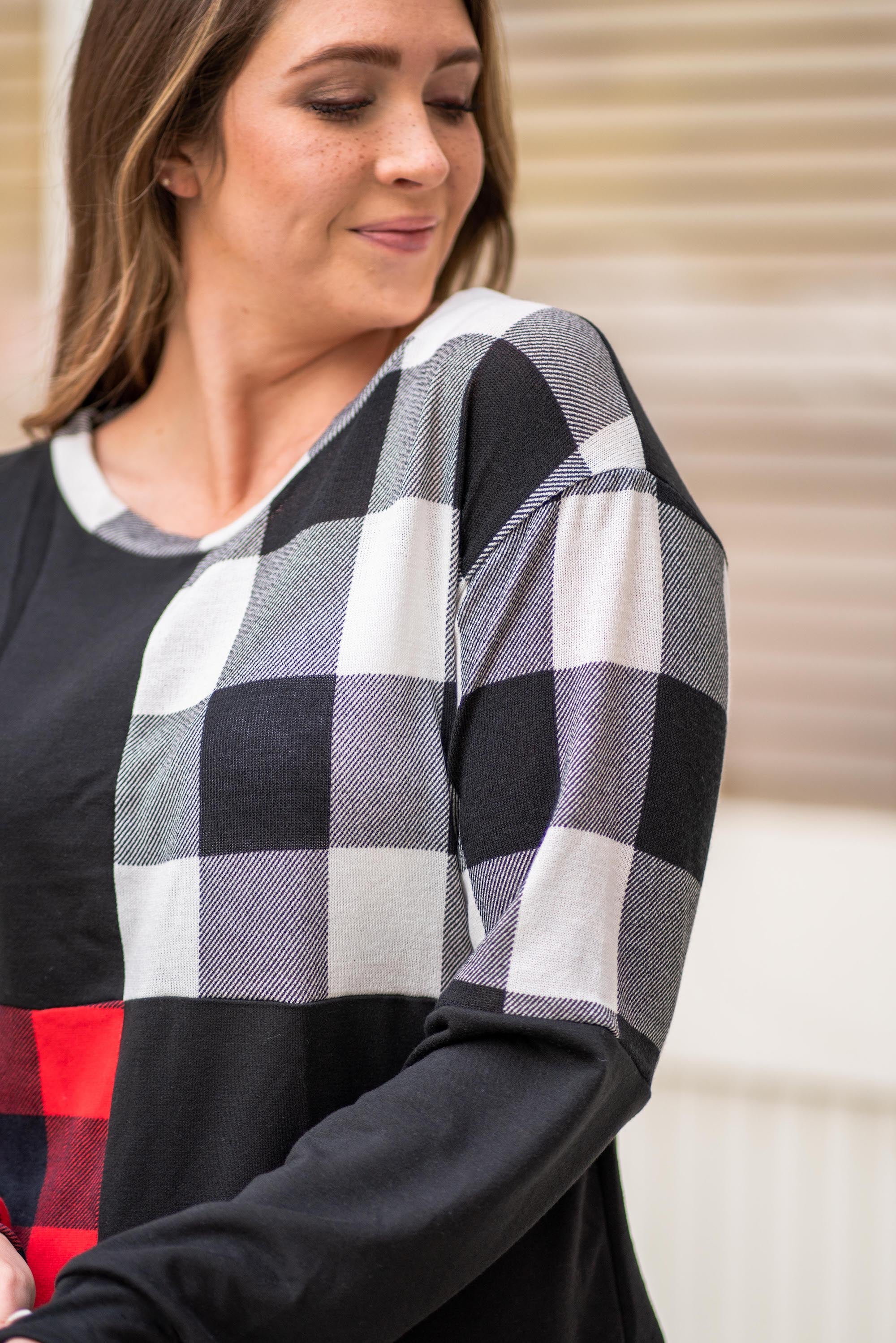 BiBi Throw on for an easy casual look with your favorite jeans this fall. Color: Black Neckline: V Neck Sleeve: Long Style #: BT2116 Contact us for any additional measurements or sizing.