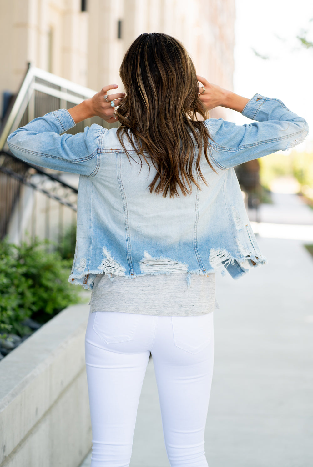 KanCan Jeans Collection: Summer 2021 Color: Light Blue Wash Cut: Fitted Style Denim Jacket with Princess Sleeves Ripped & Distressed with Fray Hem 22.75" Length Material: 100% Cotton Stitching: Classic Style #: KC6344L Contact us for any additional measurements or sizing.