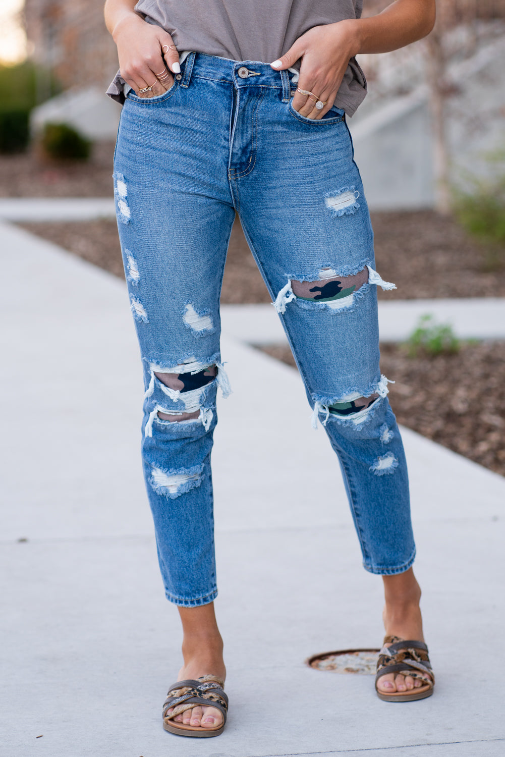 KanCan Jeans These 100% cotton mom jeans will become your go to! With no spandex, these jeans will mold to your body shape and feel amazing. Pair with heels or tennies, you cant go wrong with a high rise straight like these. Collection: Spring 2021 Color: Medium Blue Wash Cut: Straight Fit, 27" Inseam Rise: High-Rise, 11" Front Rise 100% Cotton Fly: Zipper Style #: KC7859M Contact us for additional questions about size or fit.