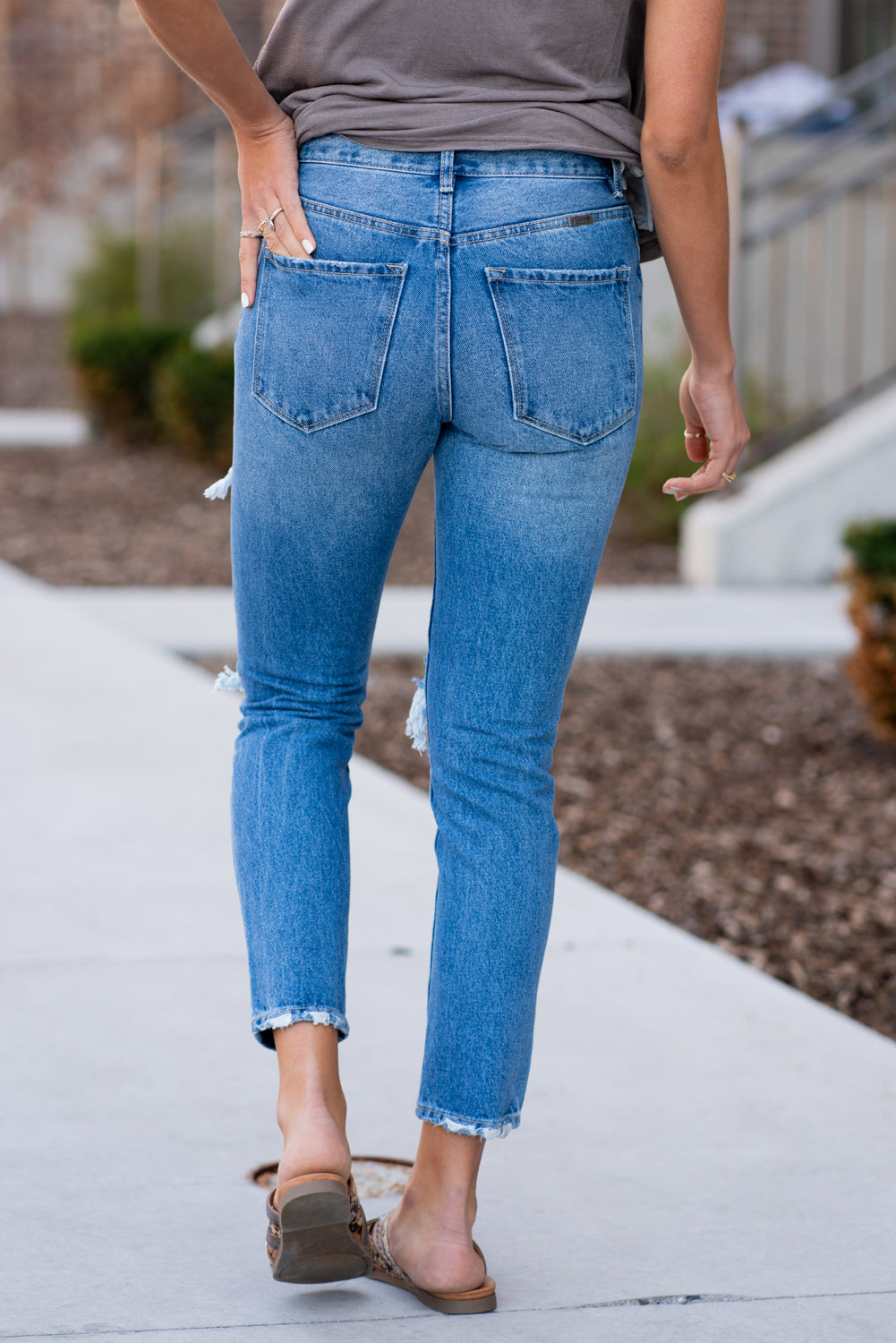 KanCan Jeans These 100% cotton mom jeans will become your go to! With no spandex, these jeans will mold to your body shape and feel amazing. Pair with heels or tennies, you cant go wrong with a high rise straight like these. Collection: Spring 2021 Color: Medium Blue Wash Cut: Straight Fit, 27" Inseam Rise: High-Rise, 11" Front Rise 100% Cotton Fly: Zipper Style #: KC7859M Contact us for additional questions about size or fit.
