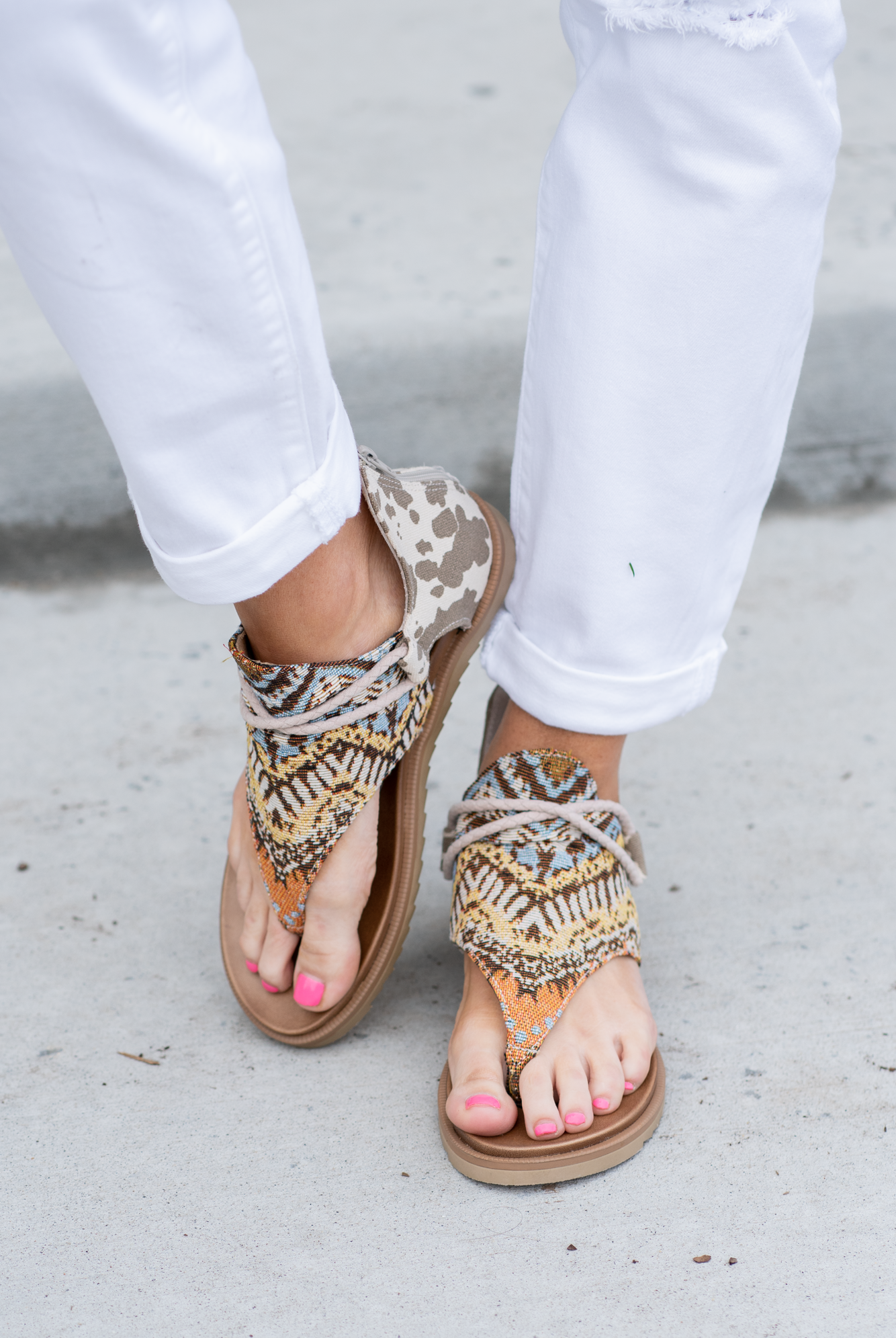 Strappy Sandal by Very G These iconic boutique sandals from Very G are must-have! Wear all spring/summer to add a little sass to your wardrobe. Style Name: Rock With Me Color: Tan Cream Cushioned Footbed Durable Textured Outsole Style #: VGSA0196-TanCream Contact us for any additional measurements or sizing.
