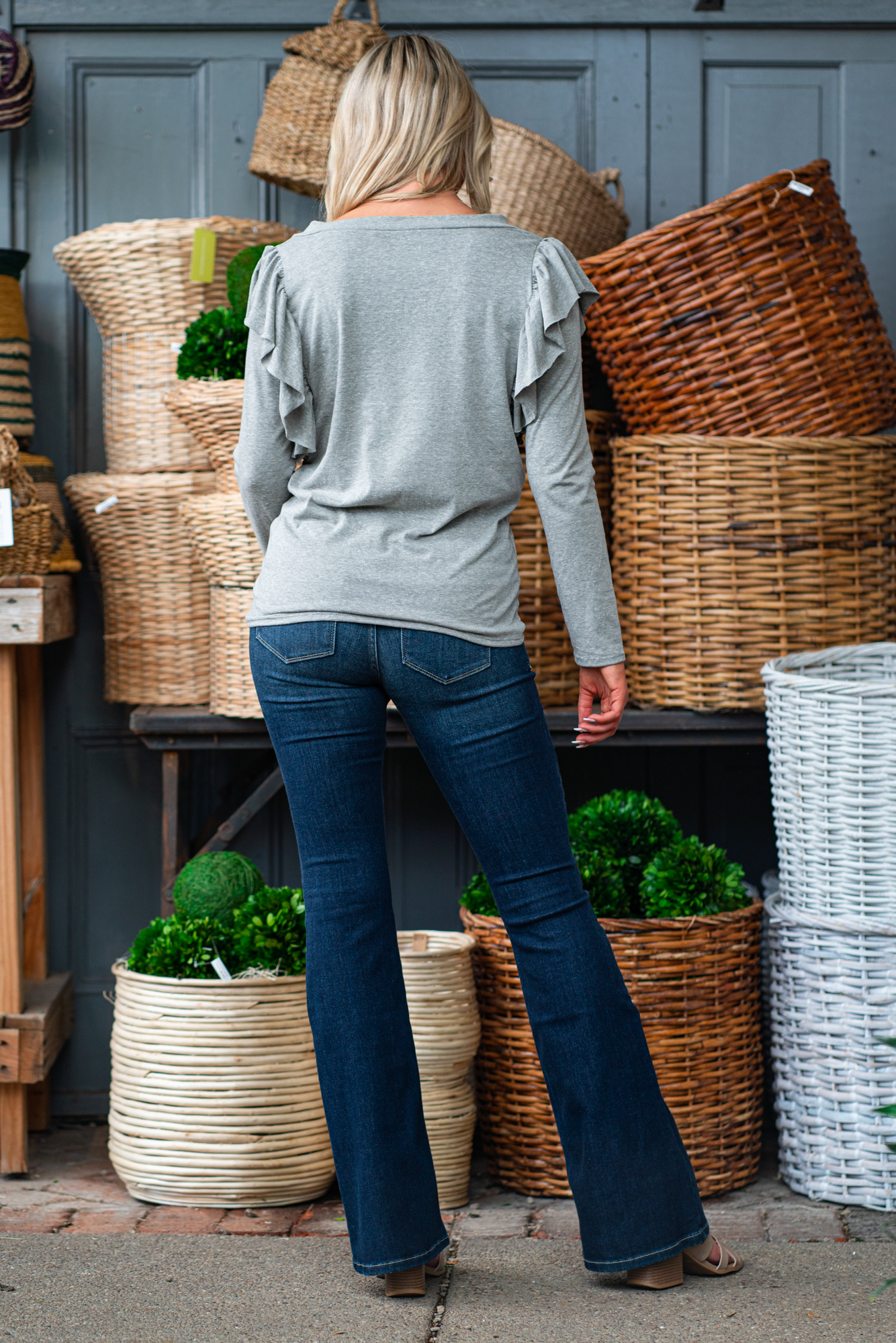 BiBi Throw on for an easy casual look with your favorite jeans. Color: Heather Grey Neckline: V Neck Sleeve: Long Style #: BT2800-01 Contact us for any additional measurements or sizing.