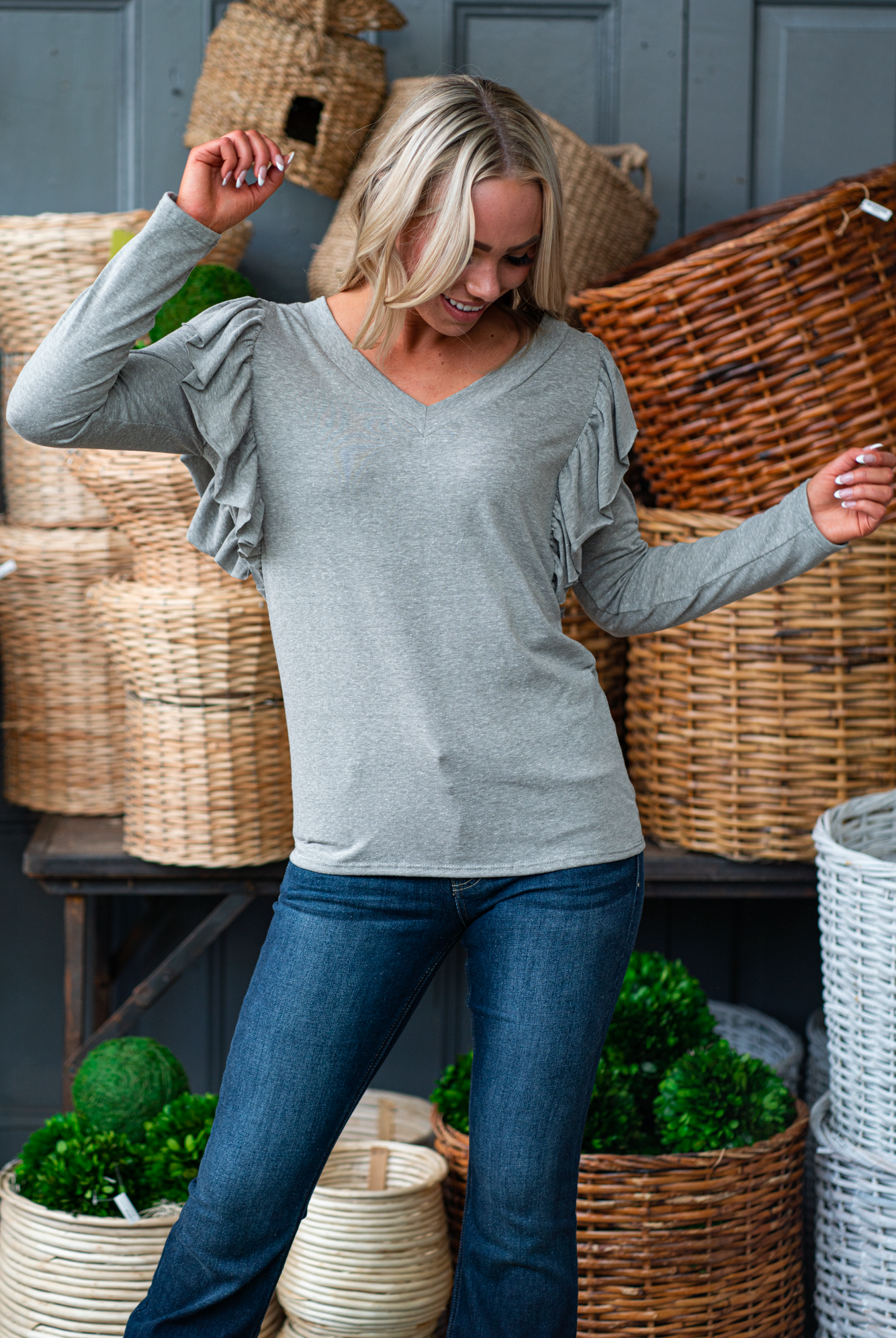 BiBi Throw on for an easy casual look with your favorite jeans. Color: Heather Grey Neckline: V Neck Sleeve: Long Style #: BT2800-01 Contact us for any additional measurements or sizing.