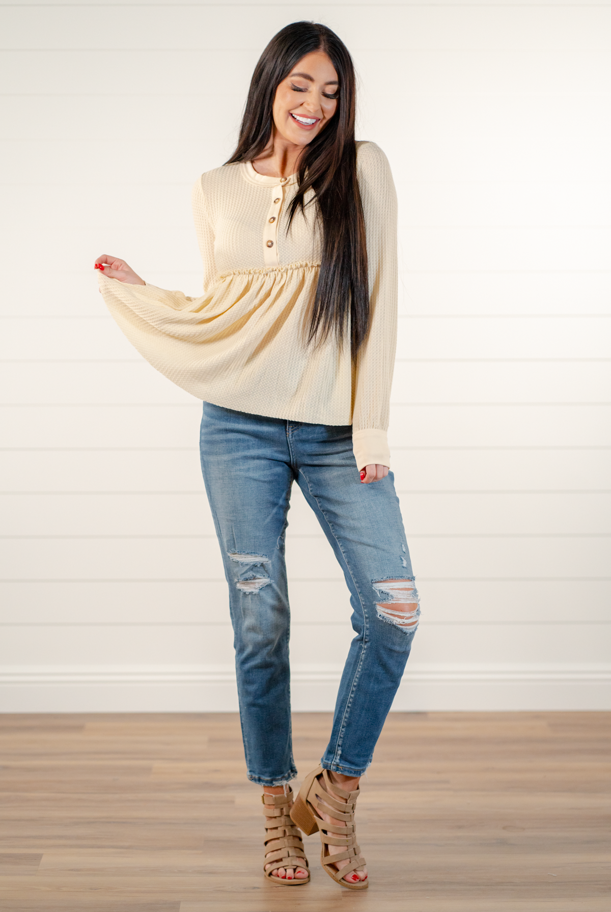 Blu Pepper Color: Oatmeal Long Sleeves Button Neckline Waffle Knit SELF: 97% POLYESTER 3% SPANDEX - CONT: 95% COTTON 5% SPANDEX Style #: BTST1184 Contact us for any additional measurements or sizing.