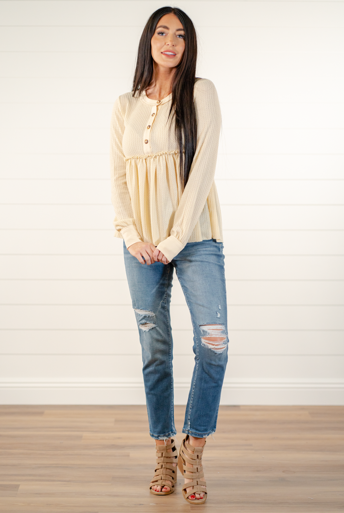 Blu Pepper Color: Oatmeal Long Sleeves Button Neckline Waffle Knit SELF: 97% POLYESTER 3% SPANDEX - CONT: 95% COTTON 5% SPANDEX Style #: BTST1184 Contact us for any additional measurements or sizing.