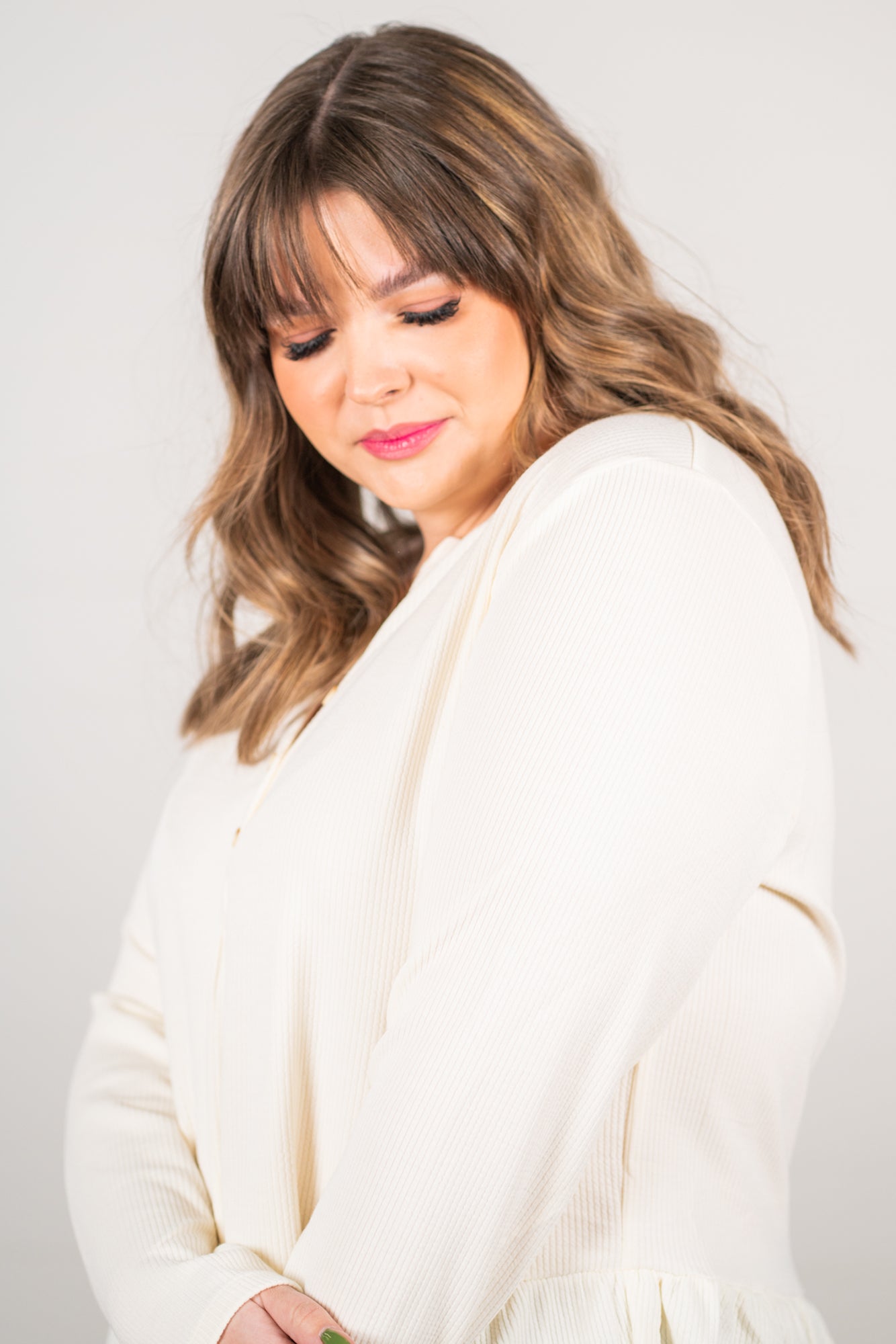 Blu Pepper Color: Ivory Ribbed Knit Long Sleeves Henley Neckline 94% POLYESTER 6% SPANDEX Style #: PCR1253 Contact us for any additional measurements or sizing.