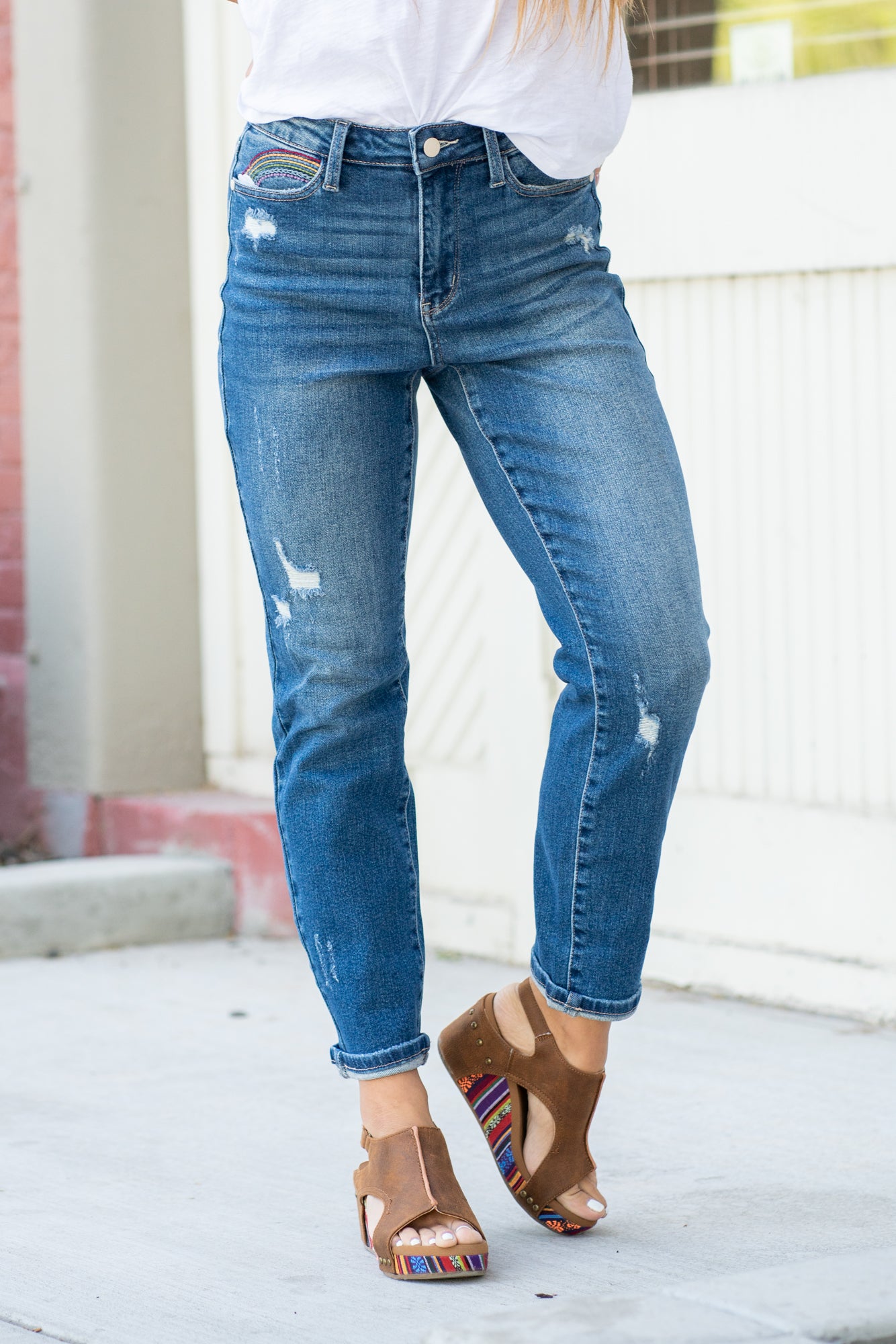 Judy Blue Don't be afraid to wear high-waisted jeans, especially these straight fits. With a medium blue wash and a rainbow embroidered detail, these will be new favorites! Color: Medium Blue Cut: Skinny, 27" Inseam* Rise: High Rise, 10.75" Front Rise* Machine Wash Separately In Cold Water Stitching: Classic Material: 94% COTTON,5% POLYESTER,1% SPANDEX Fly: Zipper Style #: JB88438 , 88438