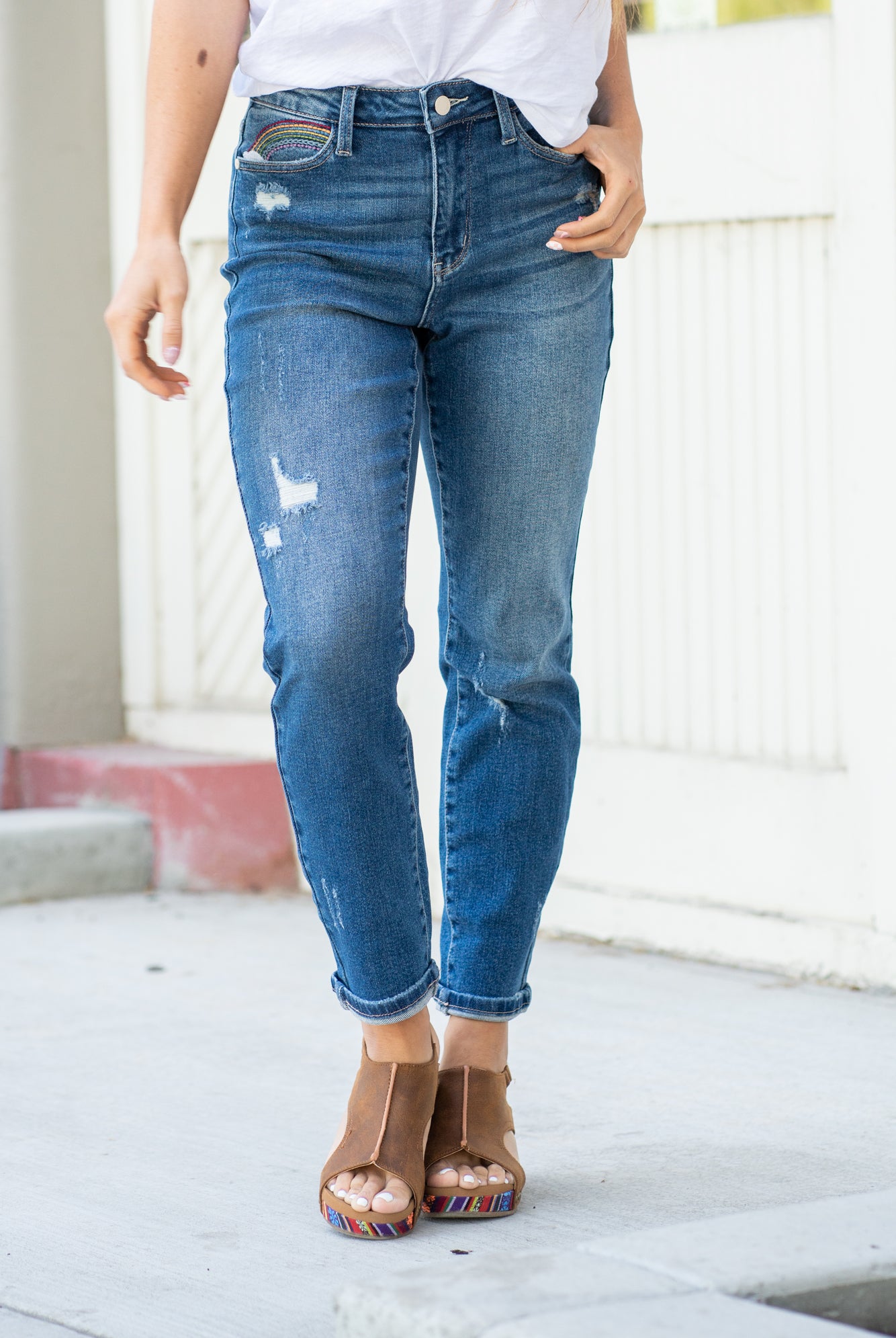 Judy Blue Don't be afraid to wear high-waisted jeans, especially these straight fits. With a medium blue wash and a rainbow embroidered detail, these will be new favorites! Color: Medium Blue Cut: Skinny, 27" Inseam* Rise: High Rise, 10.75" Front Rise* Machine Wash Separately In Cold Water Stitching: Classic Material: 94% COTTON,5% POLYESTER,1% SPANDEX Fly: Zipper Style #: JB88438 , 88438