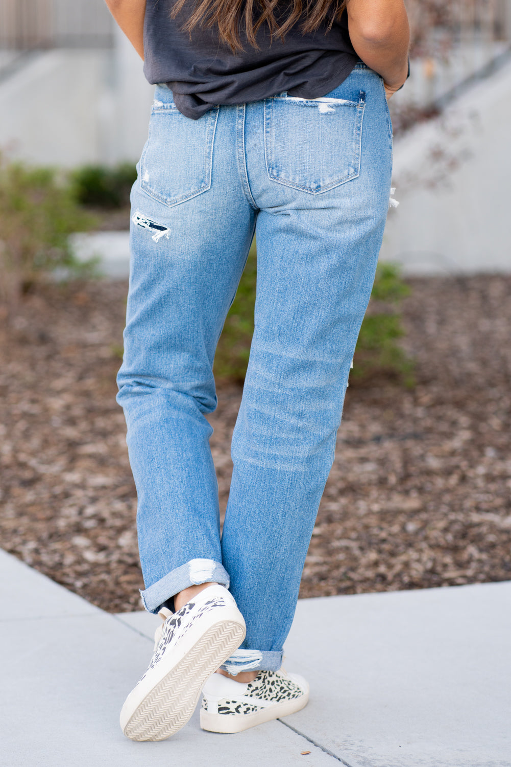 Flying Monkey Jeans Non stretch denim with distressed detail and relaxed legs. Look fitted style with a hidden button up and relaxed feel. Authentic rigid jeans with a vintage hem. Collection: Spring 2021 Name: Luv Story Cut: Mom Fit, 27" Straight Rise: High Rise, 10.5" Front Rise 100% Cotton Machine Wash Separately In Cold Water Stitching: Classic Fly: Zipper Style #: F4097 Contact us for any additional measurements or sizing.