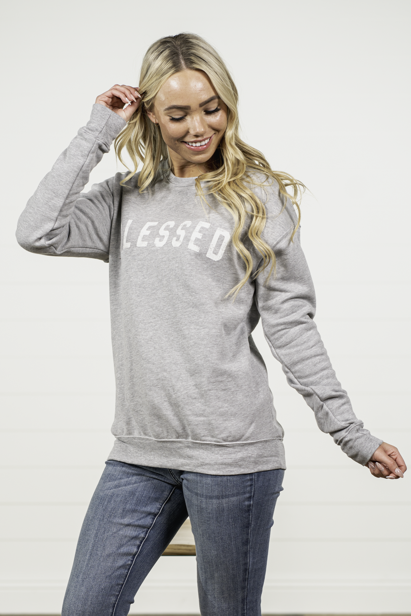 Blessed by Oat Collective   Graphic Fleece Pullover Sweater  Color: Heather Grey Neckline: Round  Sleeve: Long Sleeve Spun from plush sponge fleece fabric Ribbed Cuffed Wrist Bands Oversized Pull Over Style #: OT2112L711 Contact us for any additional measurements or sizing.  
