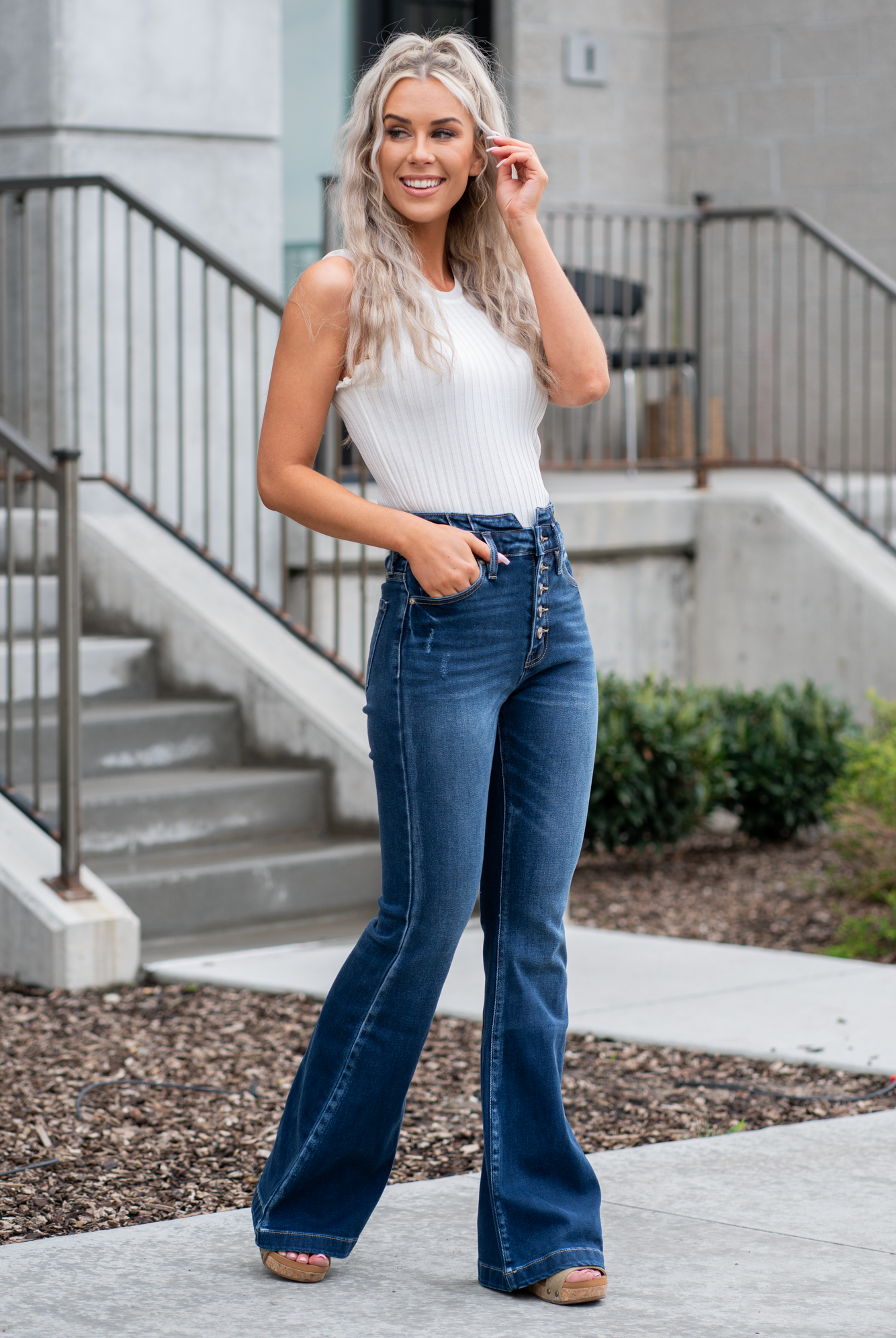 KanCan Jeans KanCan Stretch Level: Comfort Stretch Curvy Fit Flare Color: Dark Blue Wash Cut: Flare, 33" Inseam Rise: High Rise, 11" Front Rise 95% COTTON, 4% POLYESTER, 1% LYCRA Fly: Exposed Button Fly Style #: KC8602D-CV Contact us for any additional measurements or sizing. *Measured on the smallest size, measurements may vary by size.