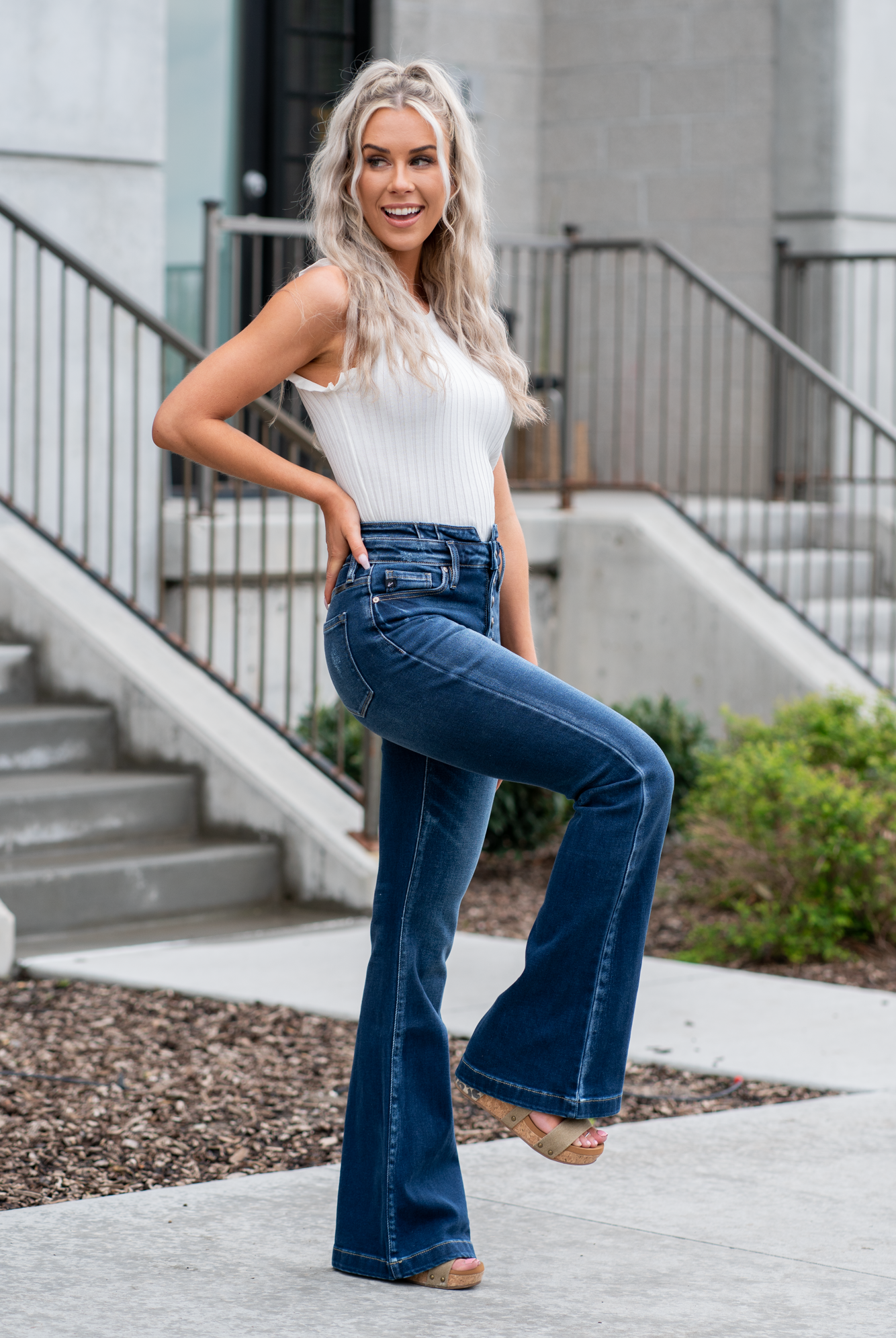 KanCan Jeans KanCan Stretch Level: Comfort Stretch Curvy Fit Flare Color: Dark Blue Wash Cut: Flare, 33" Inseam Rise: High Rise, 11" Front Rise 95% COTTON, 4% POLYESTER, 1% LYCRA Fly: Exposed Button Fly Style #: KC8602D-CV Contact us for any additional measurements or sizing. *Measured on the smallest size, measurements may vary by size.