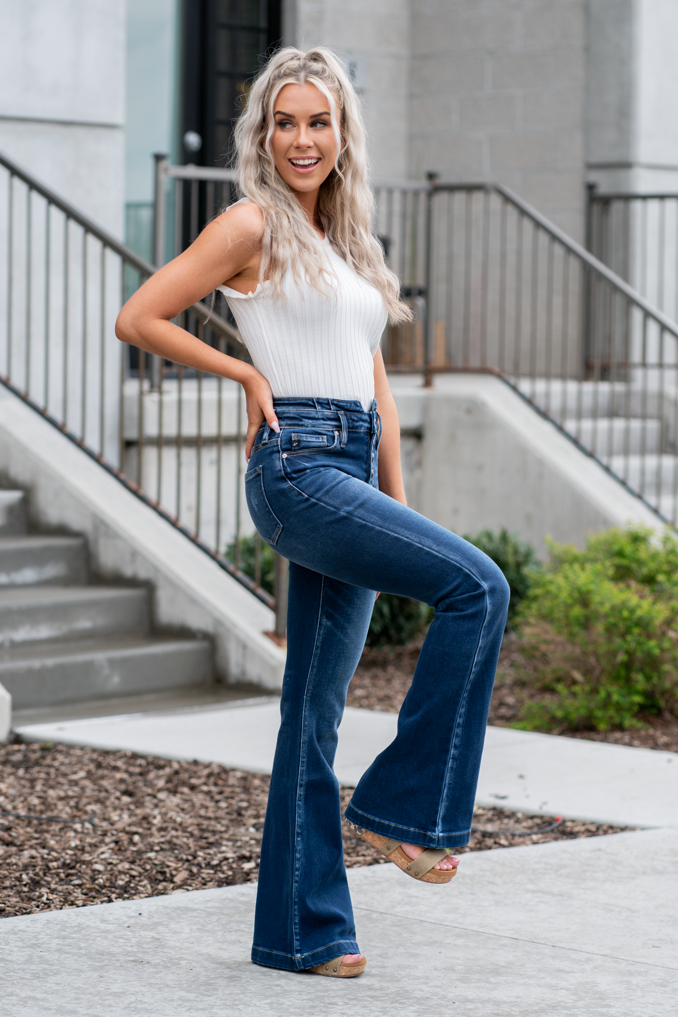 KanCan Jeans KanCan Stretch Level: Comfort Stretch Curvy Fit Flare Color: Dark Blue Wash Cut: Flare, 33" Inseam Rise: High Rise, 11" Front Rise 95% COTTON, 4% POLYESTER, 1% LYCRA Fly: Exposed Button Fly Style #: KC8602D-CV Contact us for any additional measurements or sizing. *Measured on the smallest size, measurements may vary by size.