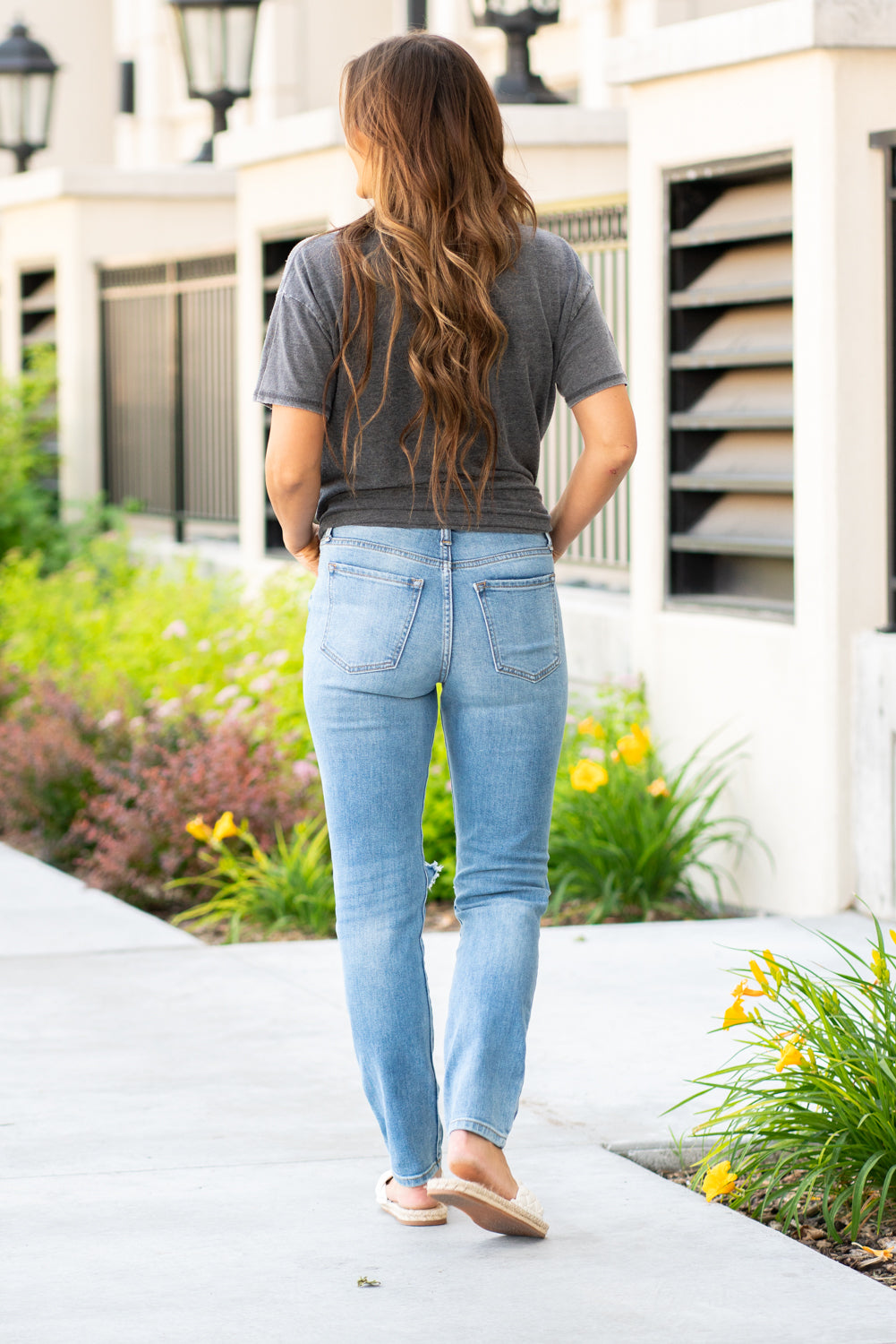 Sneak Peak Denim These sneak peak jeans have all the right holes and a super cute relaxed leg fit. Collection: Spring 2021 Tomboy Skinny Color: Medium Blue Cut: Flares, 29" Inseam Rise: High-Rise, 10.5" Front Rise 99% Cotton 1% Spandex Fly: Zipper Style #: SP-P11601 Contact us for any additional measurements or sizing.