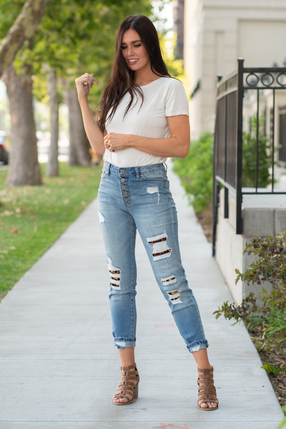 KanCan Jeans Collection: Fall 2020 Color: Medium Wash Ankle Skinny, 27" Inseam High Rise, 10" Front Rise Leopard Patch Backed Distress COTTON 99% SPANDEX 1% Fly: Zipper Style #: KC7131M Contact us for any additional measurements or sizing. Chloe is 5’8" and 130 pounds. She wears a size 3 in jeans, a small top and 8.5 in shoes. She is wearing a 26/3 in these jeans.