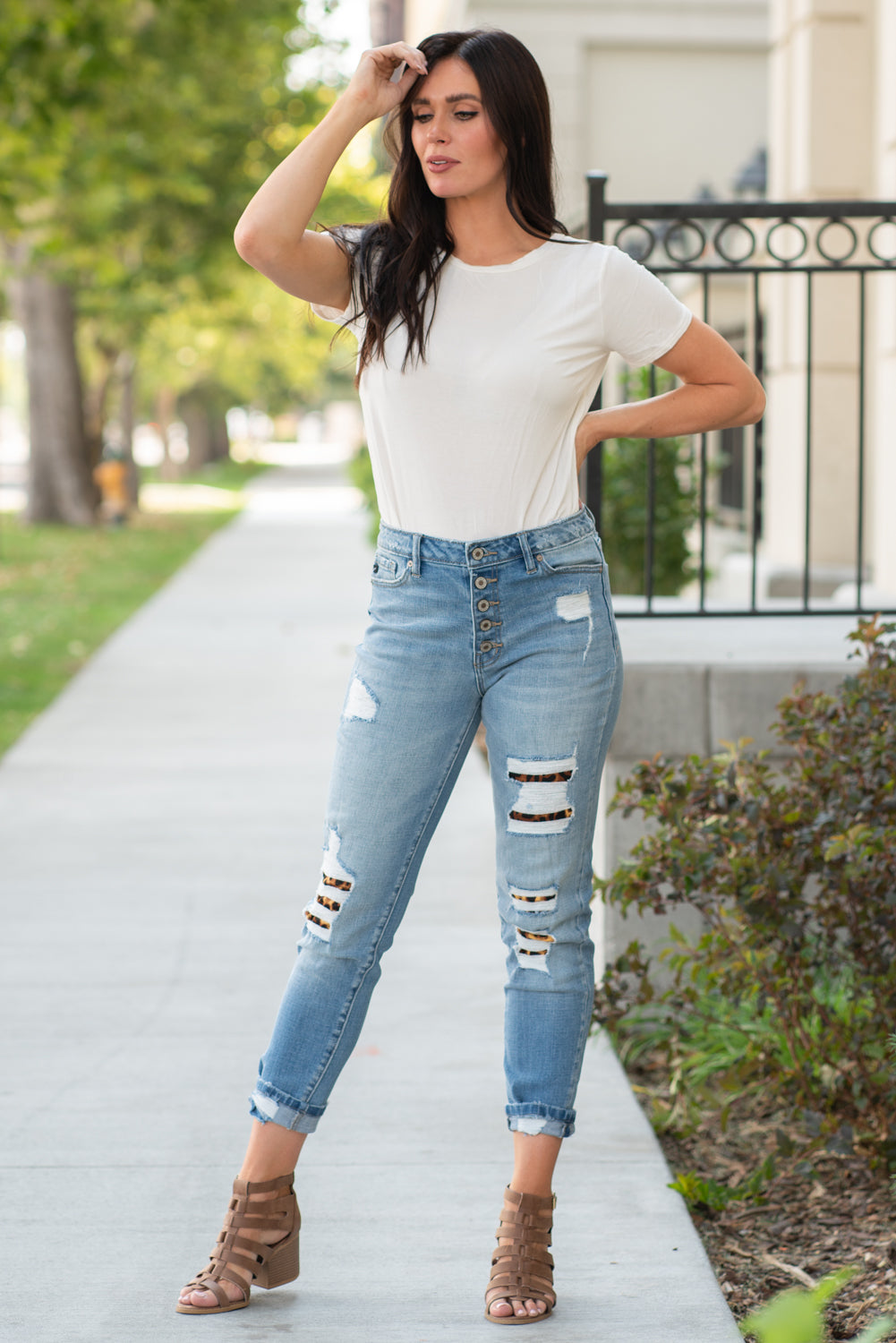 KanCan Jeans Collection: Fall 2020 Color: Medium Wash Ankle Skinny, 27" Inseam High Rise, 10" Front Rise Leopard Patch Backed Distress COTTON 99% SPANDEX 1% Fly: Zipper Style #: KC7131M Contact us for any additional measurements or sizing. Chloe is 5’8" and 130 pounds. She wears a size 3 in jeans, a small top and 8.5 in shoes. She is wearing a 26/3 in these jeans.