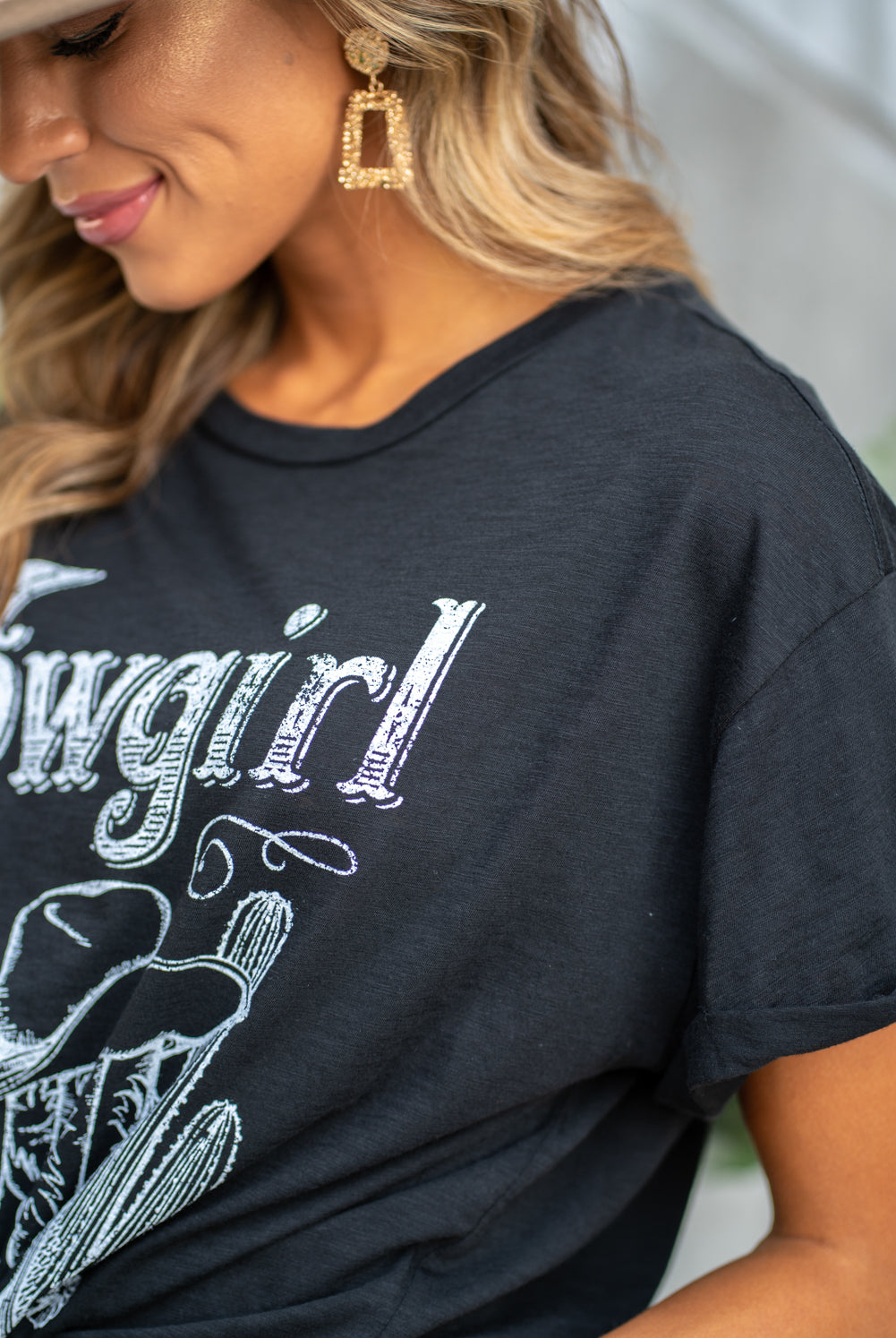 Zutter This top spoke to you, now tell everyone else. You are a cowgirl at heart. Collection: Fall 2020 Color: Black Neckline: Round Sleeve: Short Material: 50% Modal 50% Cotton Style #: F425-0139 Contact us for any additional measurements or sizing. Taylor is 5'7" and wears a size 3 in jeans, small top and an 8.5 in shoes. She is wearing a size small in this tee.