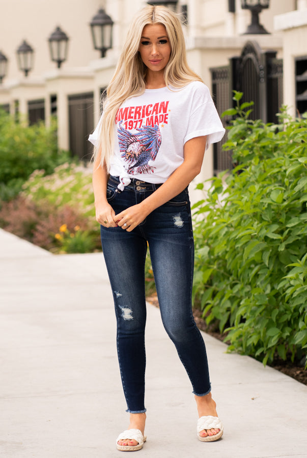 KanCan Jeans Color: Dark Wash Fray Hem Cut: Skinny, 27" Inseam Rise: High-Rise, 10" Front Rise COTTON 94.9% POLYESTER 3.8% SPANDEX 1.3% Stitching: Classic Fly: Exposed Button Fly Style #: KC7317D Contact us for any additional measurements or sizing. Haley wears a size small top, a 1 in jeans and a small in tops. She is wearing a size 24/1 in these jeans.