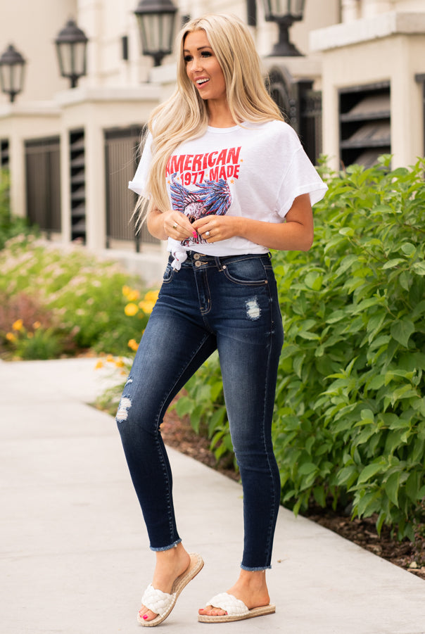KanCan Jeans Color: Dark Wash Fray Hem Cut: Skinny, 27" Inseam Rise: High-Rise, 10" Front Rise COTTON 94.9% POLYESTER 3.8% SPANDEX 1.3% Stitching: Classic Fly: Exposed Button Fly Style #: KC7317D Contact us for any additional measurements or sizing. Haley wears a size small top, a 1 in jeans and a small in tops. She is wearing a size 24/1 in these jeans.