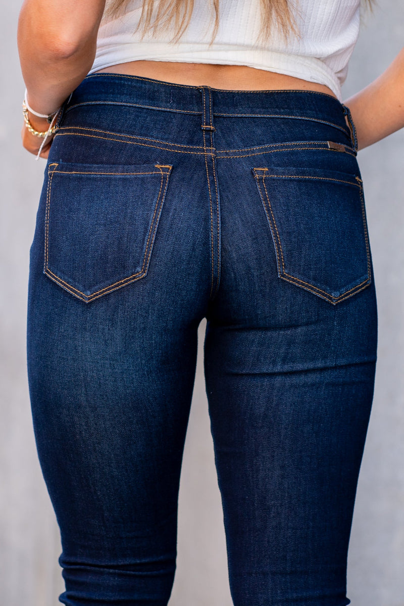 KanCan Jeans Collection: Core Style  Color: Dark Wash Cut: Skinny, 29.5" Inseam* Rise: Mid-Rise, 8.5" Front Rise* 67% COTTON, 25% POLYESTER, 7% RAYON, 1% SPANDEX Stitching: Classic Fly: Zipper  Style #: KC11245SD Contact us for any additional measurements or sizing.  *Measured on the smallest size, measurements may vary by size.