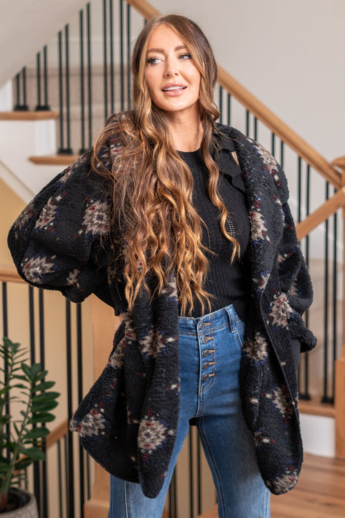Hem & Thread   This is that cozy jacket you will throw on every day and go! One size fits most with an open neckline and long sleeves and side pockets.   Color: Black Neckline: Open  Sleeve: Long 100% POLYESTER Style #: 31720-Black