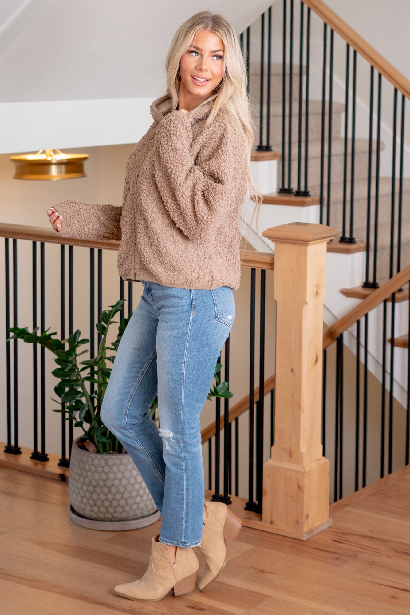 BiBi  Step into ultimate coziness with our Comfy Sherpa Zip Up Hoodie featuring a convenient pocket. This hoodie is designed for comfort, warmth, and style. The plush sherpa fabric ensures a soft touch against your skin, while the zip-up design and hoodie provide versatility for your casual or outdoor wardrobe. Perfect for chilly days or relaxed outings, this hoodie with pockets is a cozy essential that combines fashion with functionality.