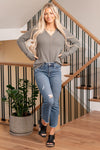 Honey High Rise Cropped Bootcut Jeans , a stylish addition to your wardrobe. These jeans feature a frayed hem, adding a trendy touch to your outfit. With their stretch fabric, they provide a comfortable and flattering fit. The 5 pocket style offers practically and convivence while the dark wash adds a sophisticated look. Elevate your style with  these fabulous jeans.