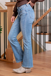 Flying Monkey  Revitalize your denim collection with the Amelia Low Rise Slim Ankle Boot Cut jeans. These jeans seamlessly blend a contemporary low-rise silhouette with a slim ankle boot cut, offering a stylish and versatile choice for any occasion. The modern fit and ankle length make them perfect for showcasing your favorite footwear.