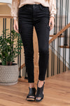 Cello Jeans  Elevate your style with these High Rise Cargo Skinny Jeans in sleek black. Crafted from stretch fabric, they offer both comfort and a flattering fit. The cargo pockets bring a trendy touch to your outfit. Cut: Skinny, 29" Inseam*  Rise:-Rise, 10" Front Rise* Color: Black 78% Cotton 20% Polyester 2% Spandex Fly: Zipper    Style #: AM19021BLK
