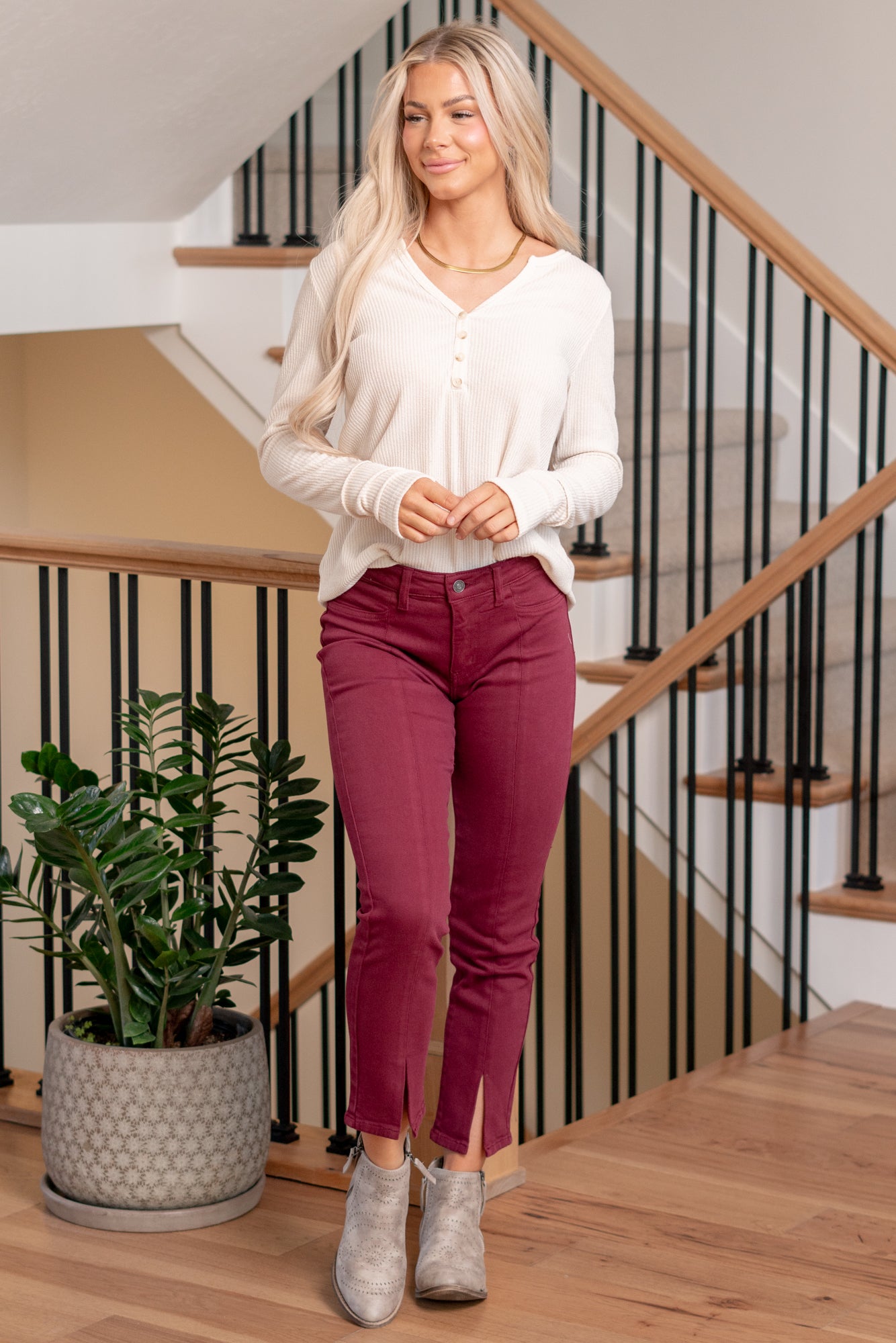 Belinda Mid Rise Skinny Straight Leg Jeans comes in three beautiful color tones. Made with stretchy denim fabric that hugs your body in the right places. This jean sits right at the waist for an easy fit that's both comfortable and chic. Features a front center slit, for an edgier look and feel.  Color: Burgundy Cut: Skinny Straight, 27" Inseam* Rise: Mid-Rise, 9.5" Front Rise* Material: 94.8% Cotton, 4% t-400, 1.2% Spandex Stitching: Classic Fly: Zipper  Style #: KC7453BU