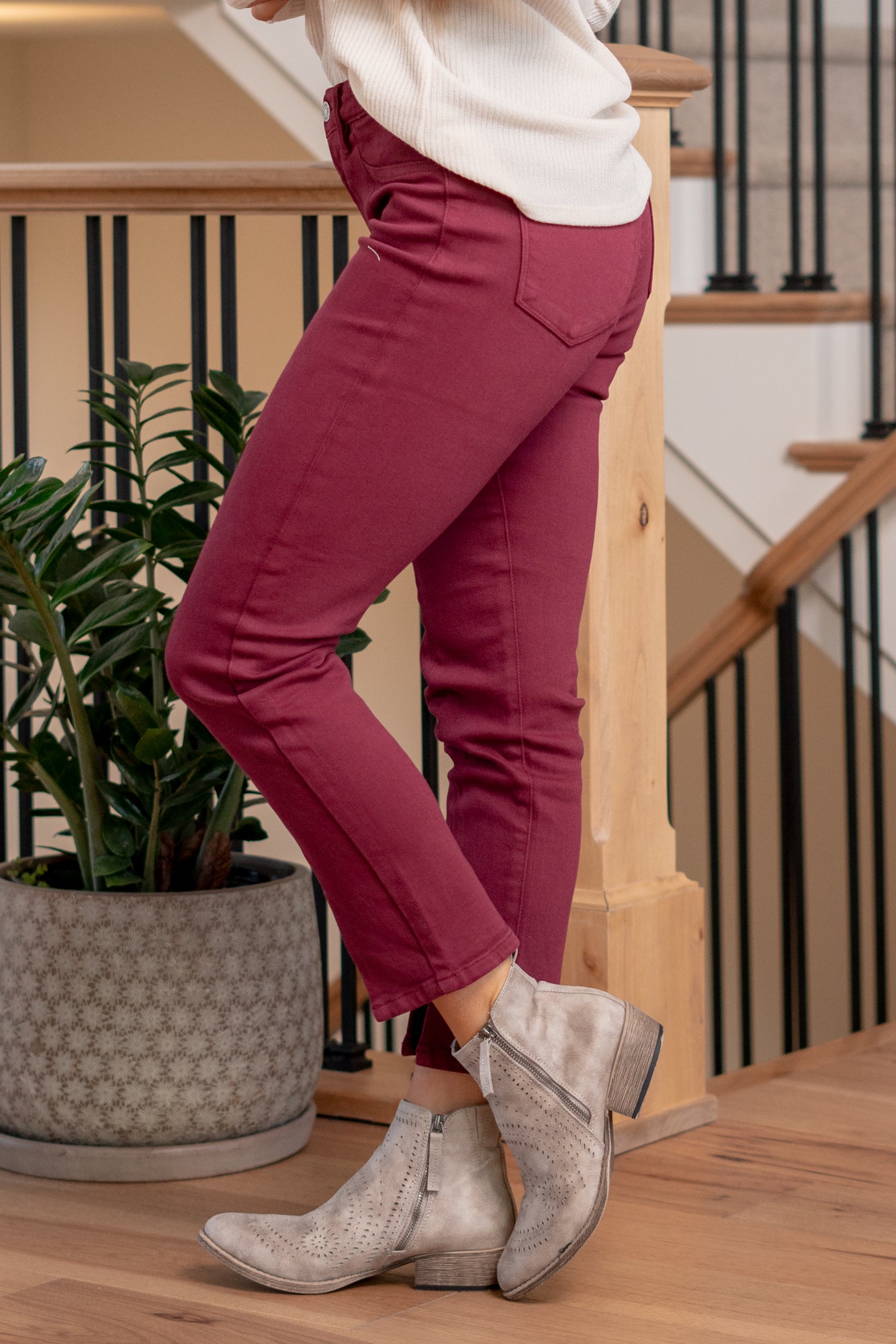Belinda Mid Rise Skinny Straight Leg Jeans comes in three beautiful color tones. Made with stretchy denim fabric that hugs your body in the right places. This jean sits right at the waist for an easy fit that's both comfortable and chic. Features a front center slit, for an edgier look and feel.  Color: Burgundy Cut: Skinny Straight, 27" Inseam* Rise: Mid-Rise, 9.5" Front Rise* Material: 94.8% Cotton, 4% t-400, 1.2% Spandex Stitching: Classic Fly: Zipper  Style #: KC7453BU