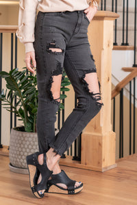 Cello Jeans  These Mom Skinny Jeans offer a fit that’s as flattering as it is comfortable. Inspired by the 90s, this jet black wash style with big cutouts along with frayed hem detail gives your look an authentic, vintage vibe.  Cut: Skinny, 27" Inseam*  Rise:-Rise, 11" Front Rise* Color: Black  60% Cotton 34% Polyester 4% Rayon 2% Spandex Fly: Zipper    Style #: WV77209M-BLK1