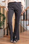 KanCan Jeans   Ultra High Rise Sateen Flare Pants. Crafted from comfortable stretch non-denim fabric, these pants offer both style and flexibility. They feature an invisible zipper with hook and closure at the back, a regular hem with a front slit, and seam details at the front and back, adding a unique and trendy touch to your outfit. Color: Black Cut: FIT, 32" Inseam* Rise:-Rise, 12" Front Rise* Material: 68% Rayon, 32% Polyester Stitching: Classic Fly: Zipper  Style #: KC2050BK