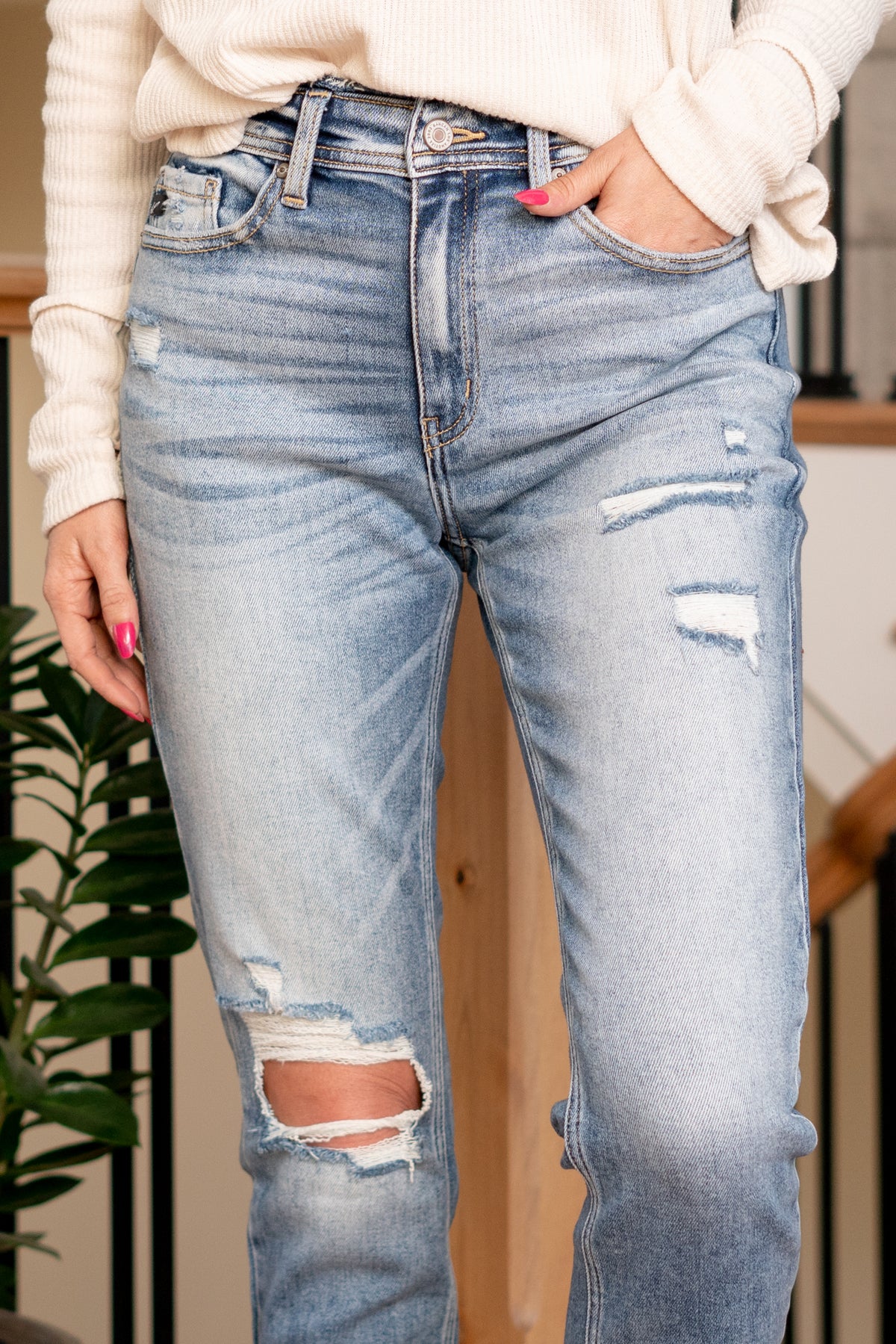 KanCan Jeans   Say hello to the Kelly High Rise Distressed Mom Jeans, a perfect blend of vintage charm and contemporary edge. These jeans feature a flattering high rise and a classic mom fit, providing a comfortable yet on-trend silhouette.