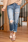 KanCan Jeans   Revamp your casual style with the Scottie Mid Rise Boyfriend Fit jeans, featuring distressed details for an effortlessly cool look. These jeans offer a comfortable mid-rise and a relaxed boyfriend fit, striking the perfect balance between laid-back and chic. The distressed details add a touch of edgy flair, making them a versatile choice for various occasions.