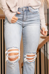 Lovervet by VERVET   Make a bold statement with the Super High Rise Kick Flare jeans featuring distressed details. These jeans boast a super high-rise fit and a trendy kick flare leg, providing a flattering silhouette with a touch of edge. The distressed details add a touch of modernity, making them a versatile choice for both casual and more elevated looks.