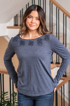 Hem & Thread   Introducing the Morgan Embroidered Tie Back Long Sleeve Tee – a blend of style and comfort with delicate embroidery and a flattering tie-back design, perfect for any occasion.  Color: Navy Neckline: Open  Material: 65% Cotton 35% Polyester Style #: 31576W-Navy Contact us for any additional measurements or sizing. 