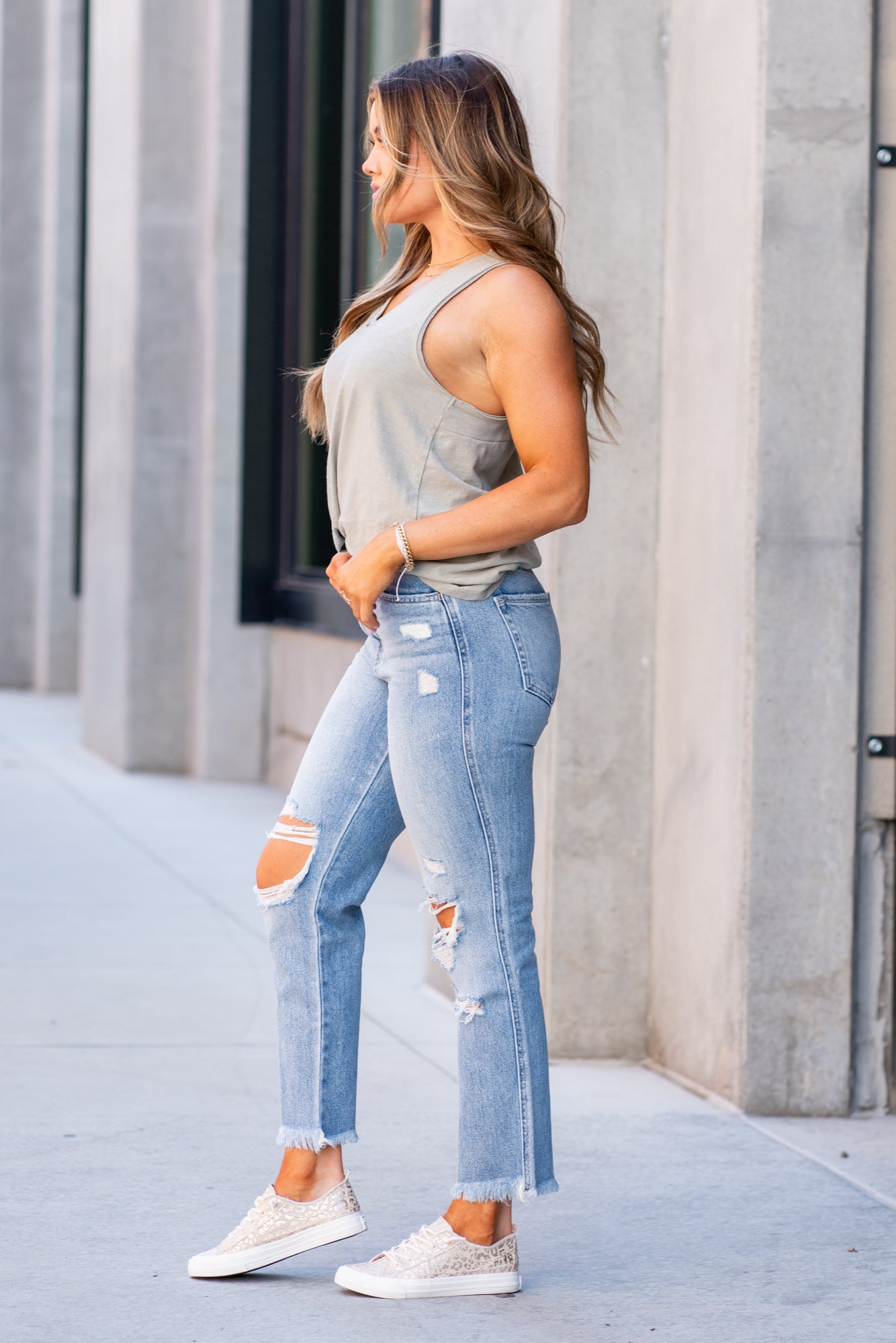 Flying Monkey Jeans  Non-stretch denim with distressed detail and relaxed legs. Look fitted style with a hidden button-up and relaxed feel. Authentic rigid jeans with a vintage hem. Collection: Core Style Name: Apart Cut: Mom Fit, 28" Straight Rise: High Rise, 11" Front Rise 100% Cotton Machine Wash Separately In Cold Water Stitching: Classic Fly: Zipper Style #: Y3920 Contact us for any additional measurements or sizing.