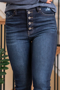 KanCan Jeans   Elevate your style with these High Rise Super Skinny Jeans. Crafted from super stretch fabric, they prioritize both comfort and a flattering fit. The five-pocket style adds a classic touch, while the frayed hem and exposed button fly bring a trendy vibe. Color: Rinse, Dark Blue Wash Cut: Super Skinny, 28" Inseam* Rise:-Rise, 11 1/4" Front Rise* Material: 67% Cotton, 25% Polyester, 7% Rayon, 1% Spandex Stitching: Classic Fly: Button Fly  Style #: KC7273LH