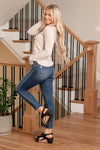 Lovervet by VERVET   Make a bold statement with the Non-Violence High Rise Cropped Skinny jeans featuring a distressed hem. These jeans boast a high-rise silhouette and a cropped skinny fit, providing a flattering and on-trend look. The distressed hem adds a touch of edginess, making them a versatile choice for both casual and elevated looks.