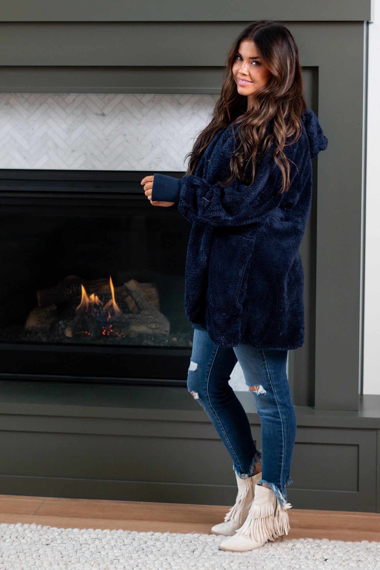 Hem & Thread   This is that cozy jacket you will throw on every day and go! One size fits most with an open neckline and long sleeve and side pockets.   Color: Navy Neckline: Open  Sleeve: Long 100% POLYESTER Style #: L2394-Navy Contact us for any additional measurements or sizing. 