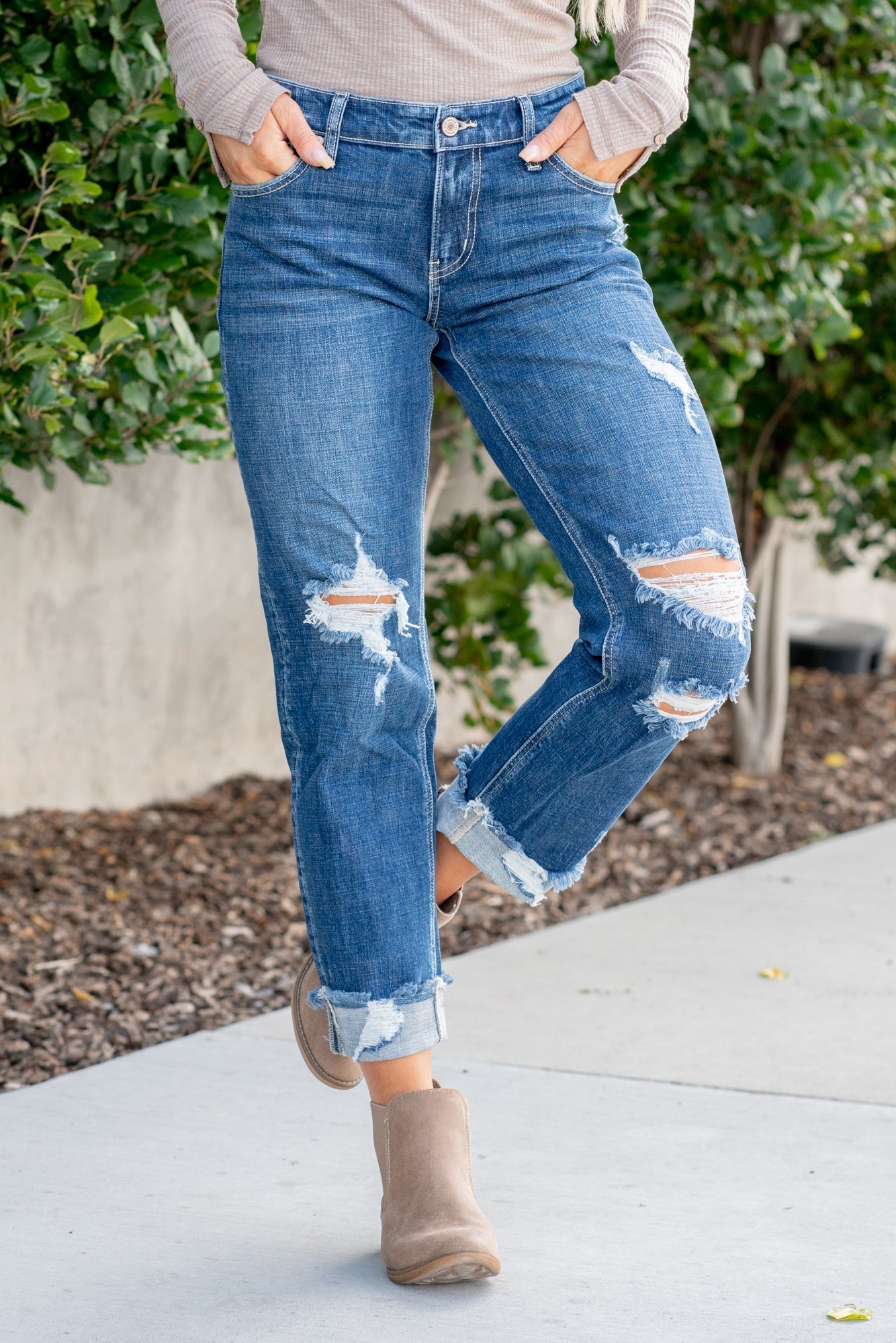 KanCan Jeans  These mid-rise boyfriend jeans hit at exactly the right spot on your waist and with some spandex, these will stretch as you wear and get super comfy!  Color: Dark Blue Wash Cut: Cuffed Boyfriend, 26" Inseam* Rise: Mid-Rise, 9.25" Front Rise* 99% COTTON, 1% SPANDEX Stitching: Classic Fly: Zipper Style #: KC8652D Contact us for any additional measurements or sizing.  