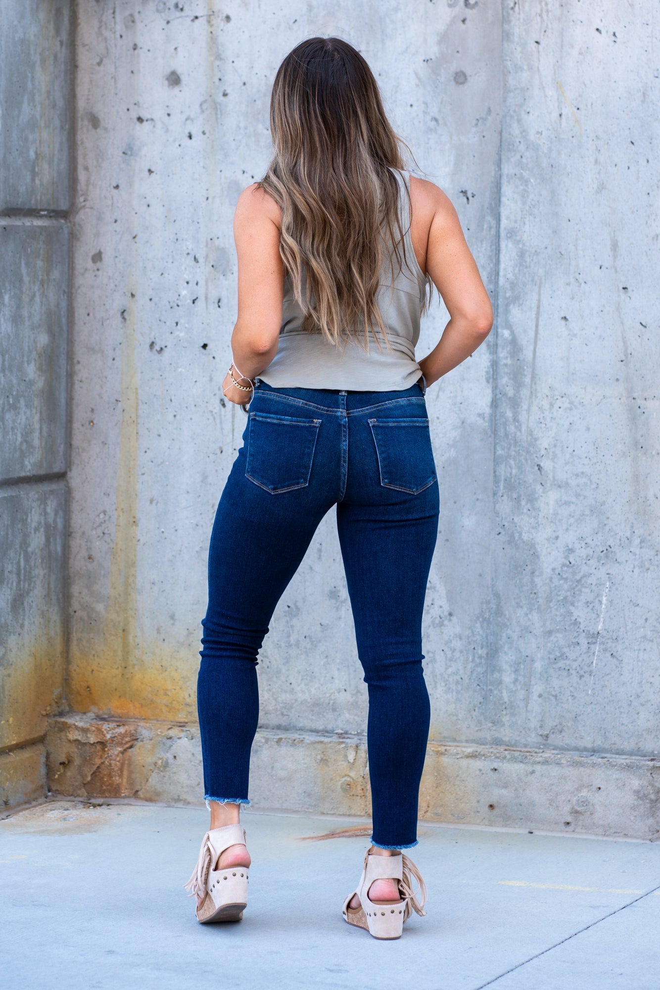 VERVET by Flying Monkey Jeans  This comfortable stretchy denim has a calf-hugging fit, fray hem bottom, and zipper with a distressed hem.  Skinny Cut, 30" Inseam* Mid Rise, 9" Front Rise*  98% COTTON, 2% POLYESTER Machine Wash Separately In Cold Water Stitching: Classic Fly: Zipper  Style #: V2159D Contact us for any additional measurements or sizing. 