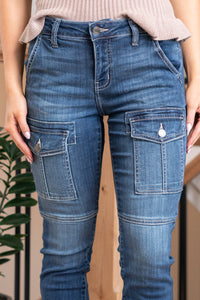 Cello Jeans  Nail a trendy and versatile look with these Mid Rise Skinny Jeans in a medium wash. These jeans feature a stylish mid-rise fit and unique front patched pockets, adding a touch of fashion-forward flair to your outfit. Cut: Skinny, 28" Inseam*  Rise:-Rise, 9" Front Rise* Color: Medium Wash  68% Cotton 24% Lyocell 7% Elasterell 1% Spandex Fly: Zipper    Style #: WV19026T