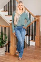 Cello Jeans  Get comfortable and trendy in these ultra stretchy jeans. The dark wash flared jegging features a flattering flared fit, a faded wash, and light whisker detail. Additionally it has two faux front pockets and two back real pockets.  