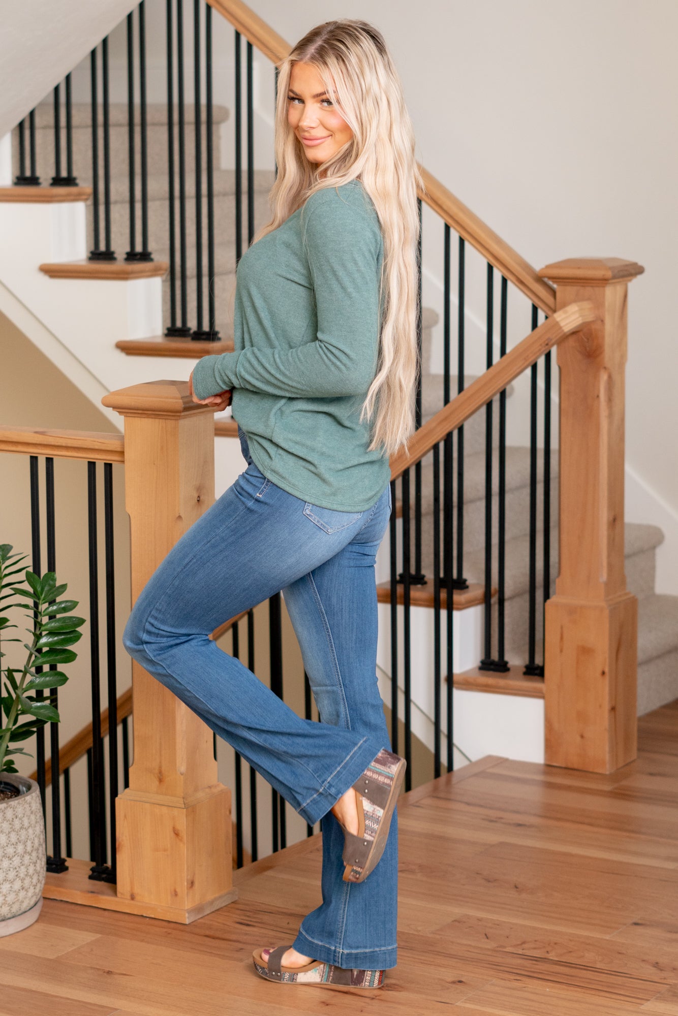 Cello Jeans  Get comfortable and trendy in these ultra stretchy jeans. The dark wash flared jegging features a flattering flared fit, a faded wash, and light whisker detail. Additionally it has two faux front pockets and two back real pockets.  