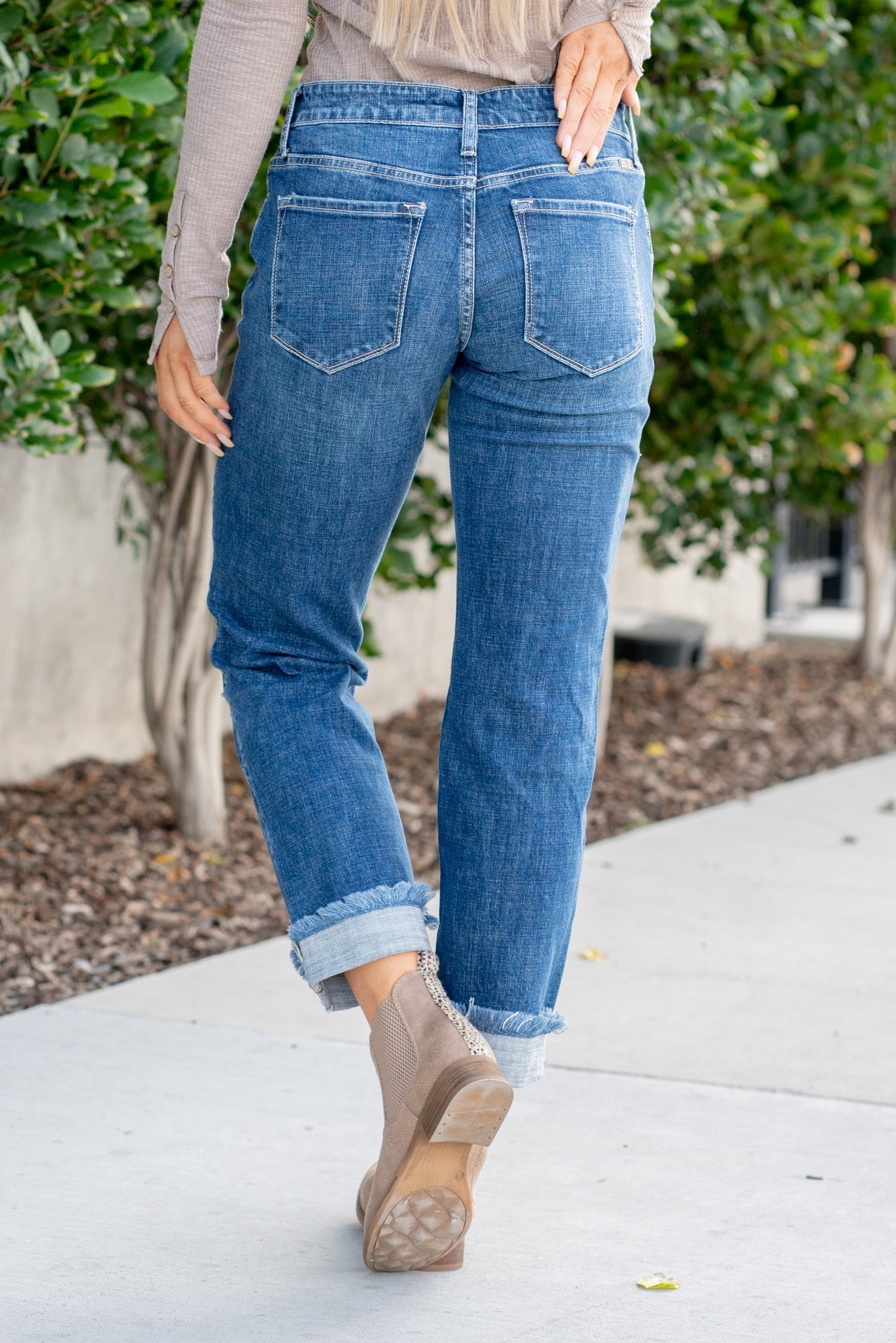 KanCan Jeans  These mid-rise boyfriend jeans hit at exactly the right spot on your waist and with some spandex, these will stretch as you wear and get super comfy!  Color: Dark Blue Wash Cut: Cuffed Boyfriend, 26" Inseam* Rise: Mid-Rise, 9.25" Front Rise* 99% COTTON, 1% SPANDEX Stitching: Classic Fly: Zipper Style #: KC8652D Contact us for any additional measurements or sizing.  