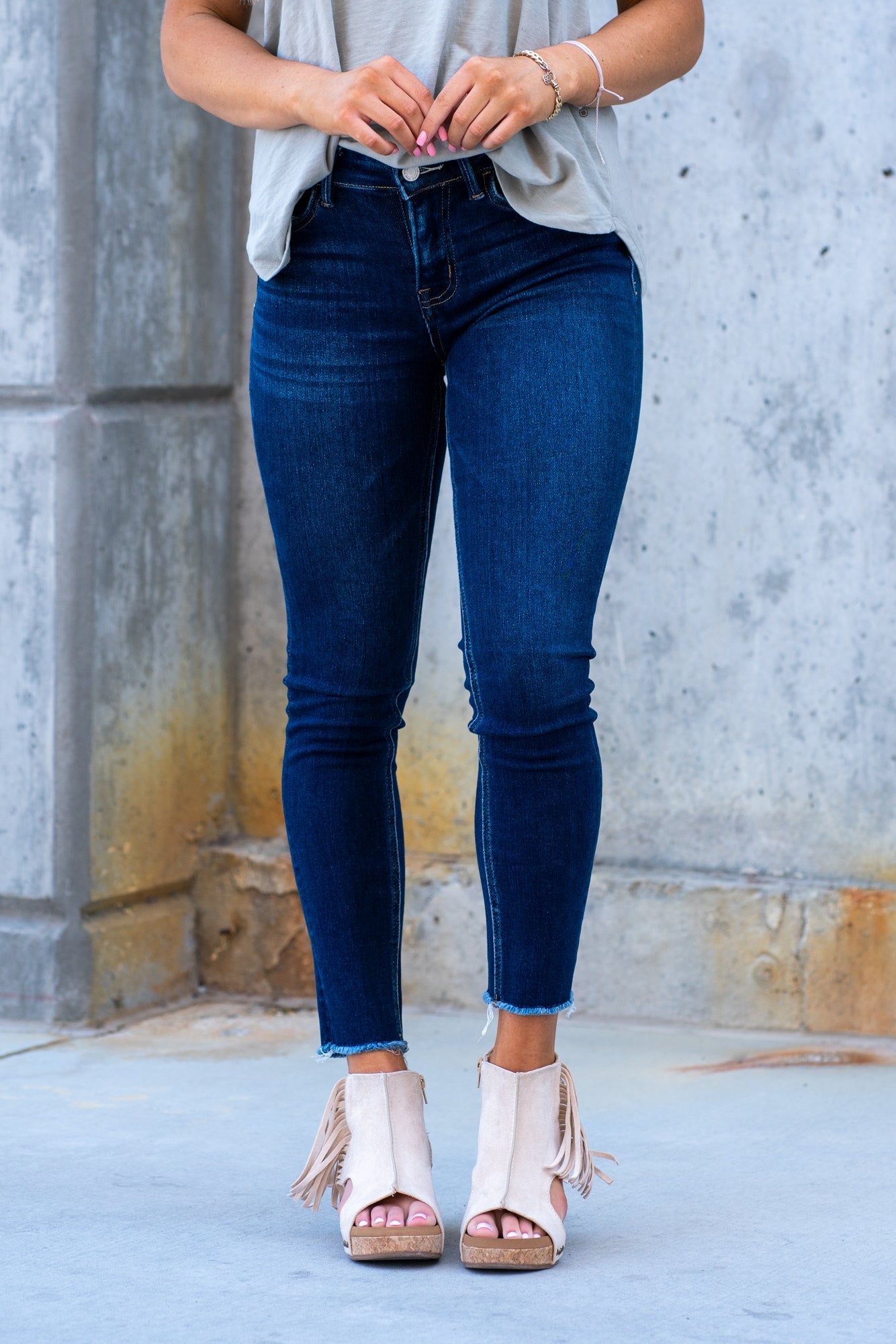 VERVET by Flying Monkey Jeans  This comfortable stretchy denim has a calf-hugging fit, fray hem bottom, and zipper with a distressed hem.  Skinny Cut, 30" Inseam* Mid Rise, 9" Front Rise*  98% COTTON, 2% POLYESTER Machine Wash Separately In Cold Water Stitching: Classic Fly: Zipper  Style #: V2159D Contact us for any additional measurements or sizing. 